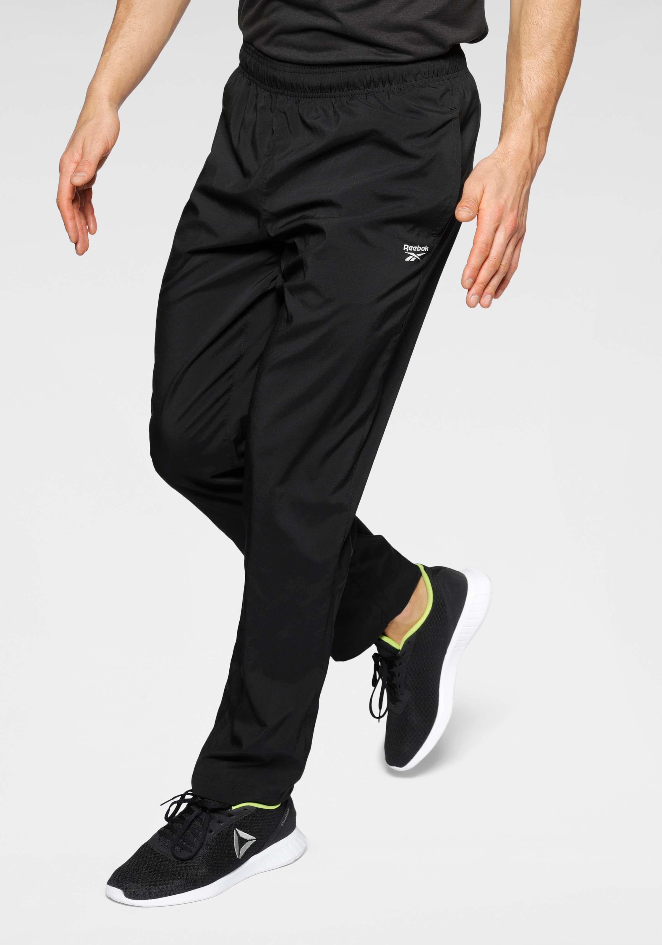 Reebok Sporthose »TRAINING ESSENTIALS WOVEN OPEN HEM PANTS« online shoppen  bei OTTO