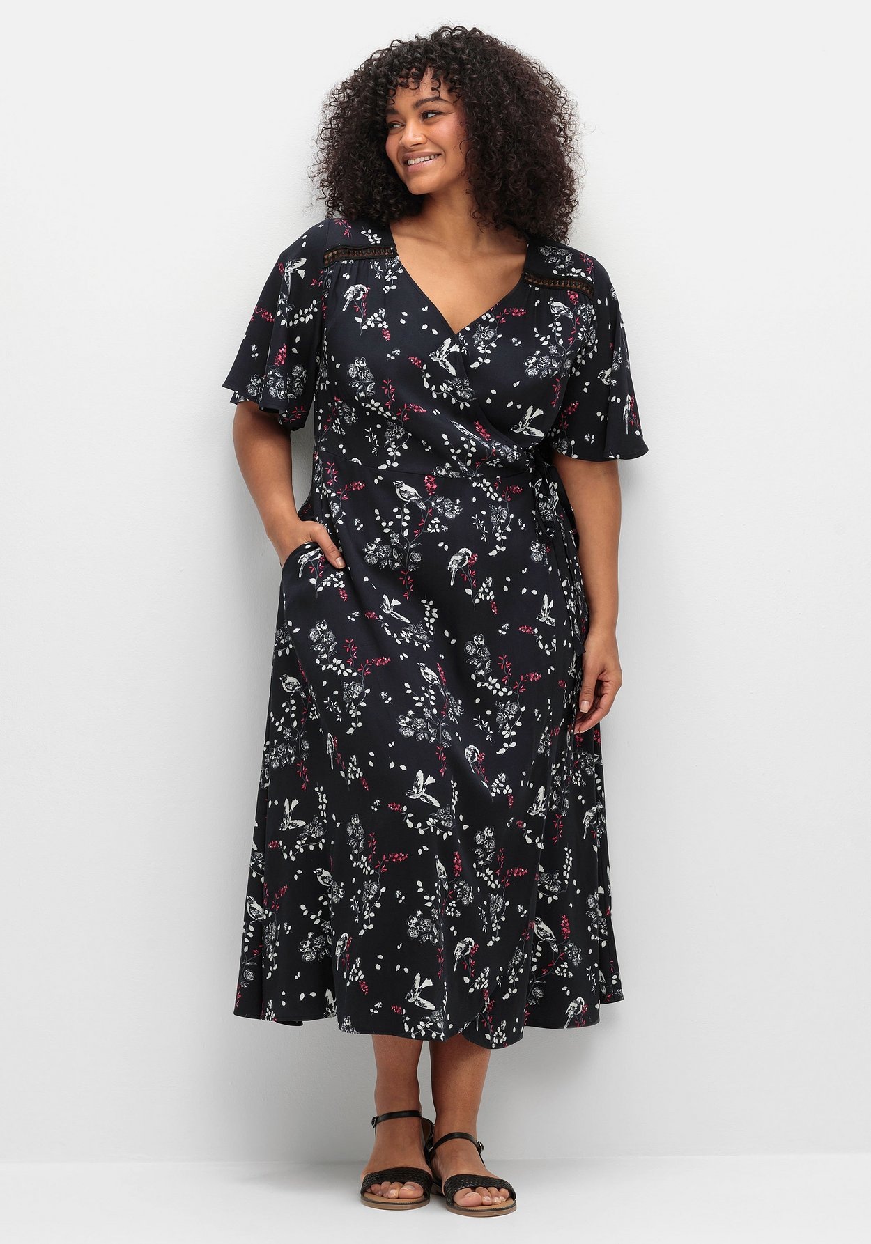 Sheego Druckkleid »Kleid in Wickeloptik, mit Alloverprint«