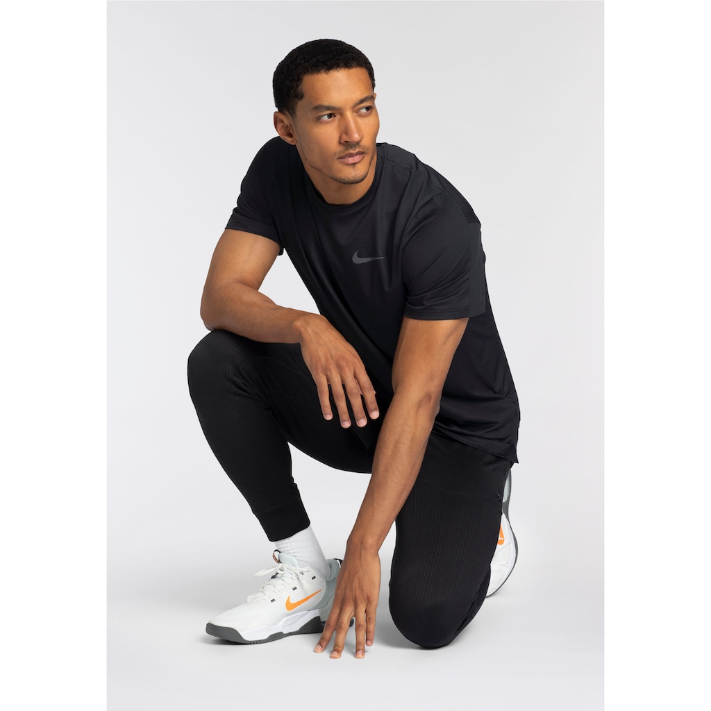 Nike Trainingshose »YOGA DRI-FIT MEN'S JOGGER«