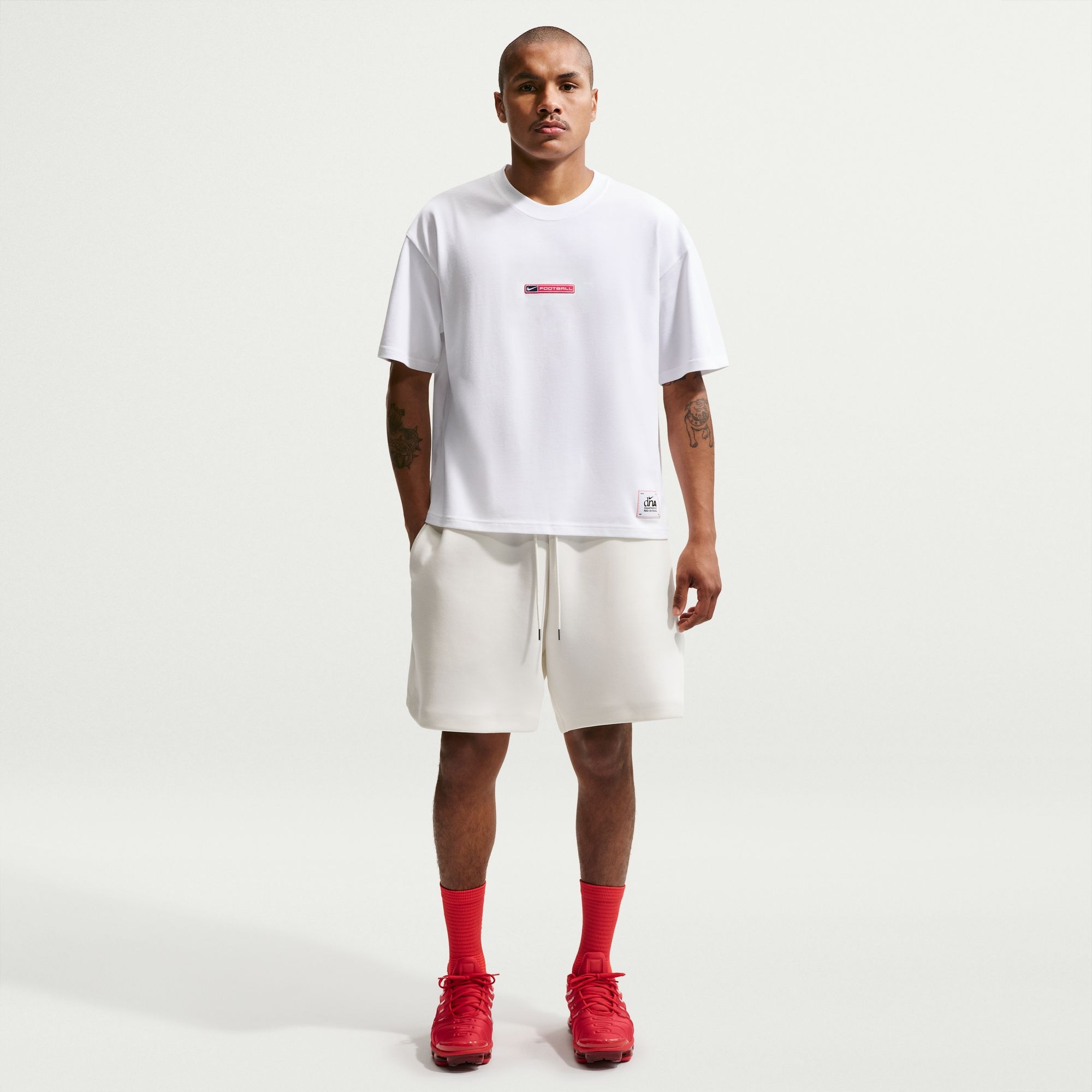 Nike Sportswear T-Shirt »M NSW TEE LSE BOXY FOOTBALL« aus Baumwolle, auch in großen Größen