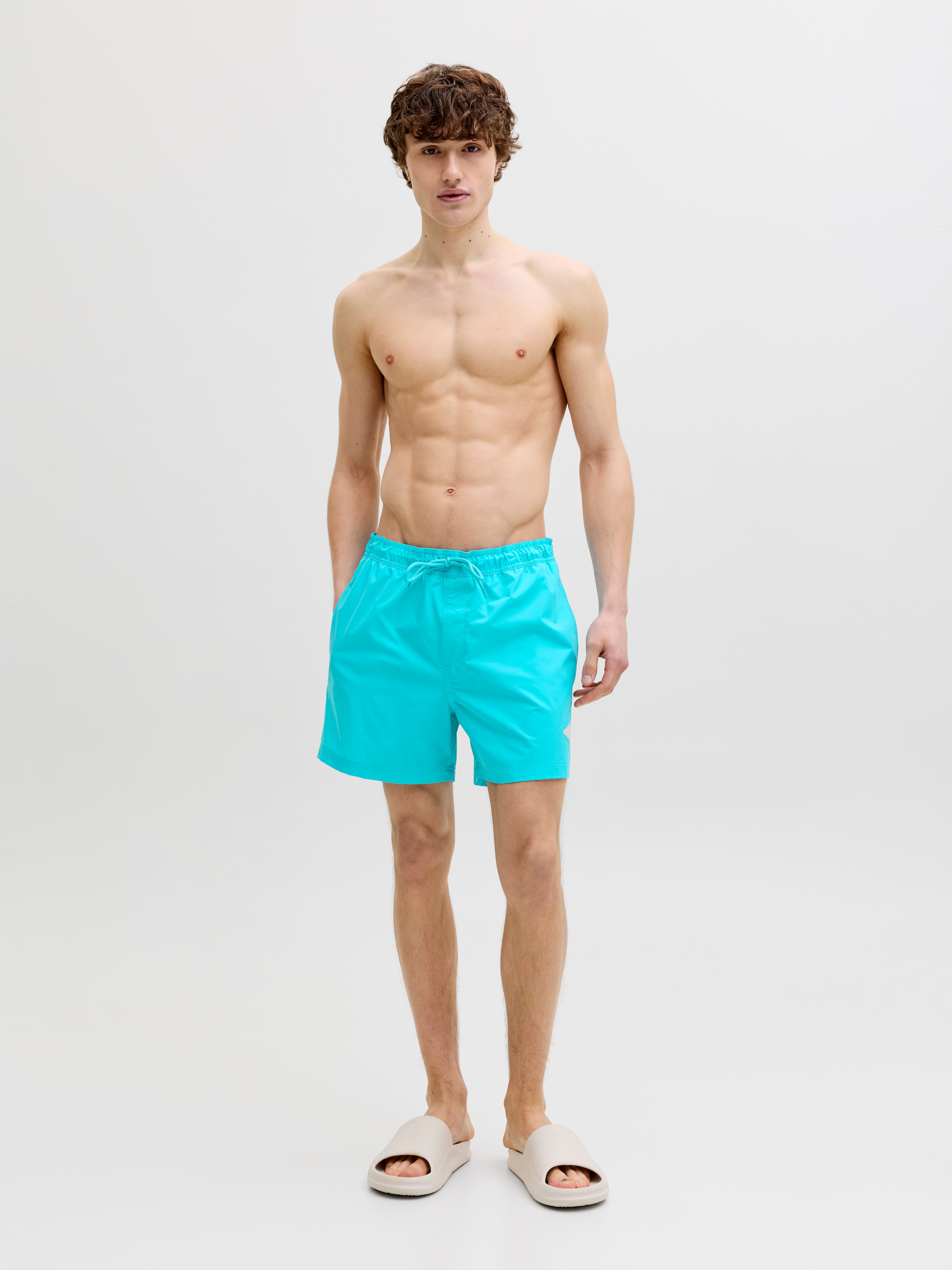 Jack & Jones Badeshorts »JPSTMAUI TROPIC SOLID SWIM SHORTS SN« Kunstfaser, normal geschnitten