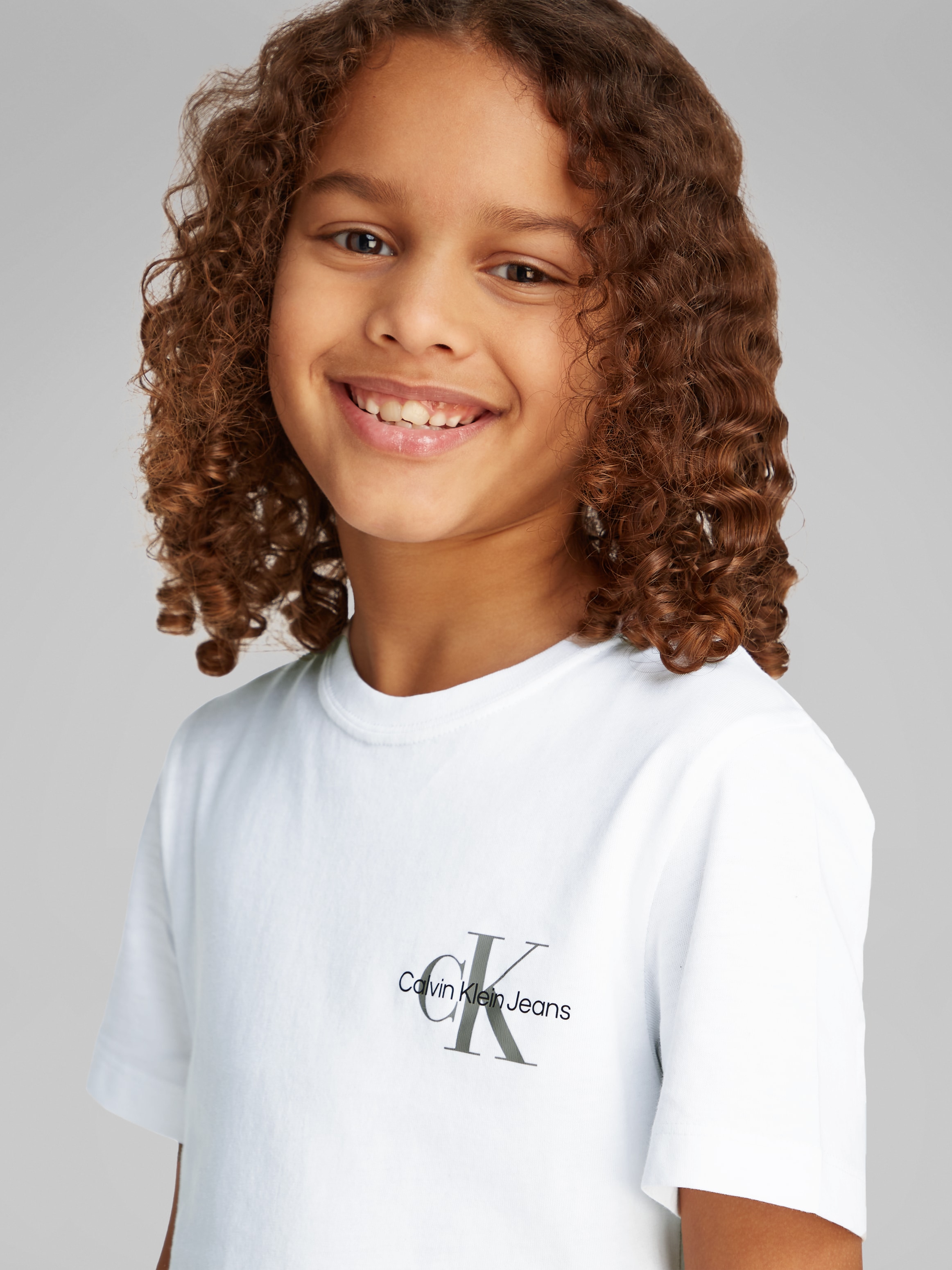Calvin Klein Jeans T-Shirt »Chest Monologo Ss T-Shirt«, für Kinder bis 16 Jahre und mit Logodruck