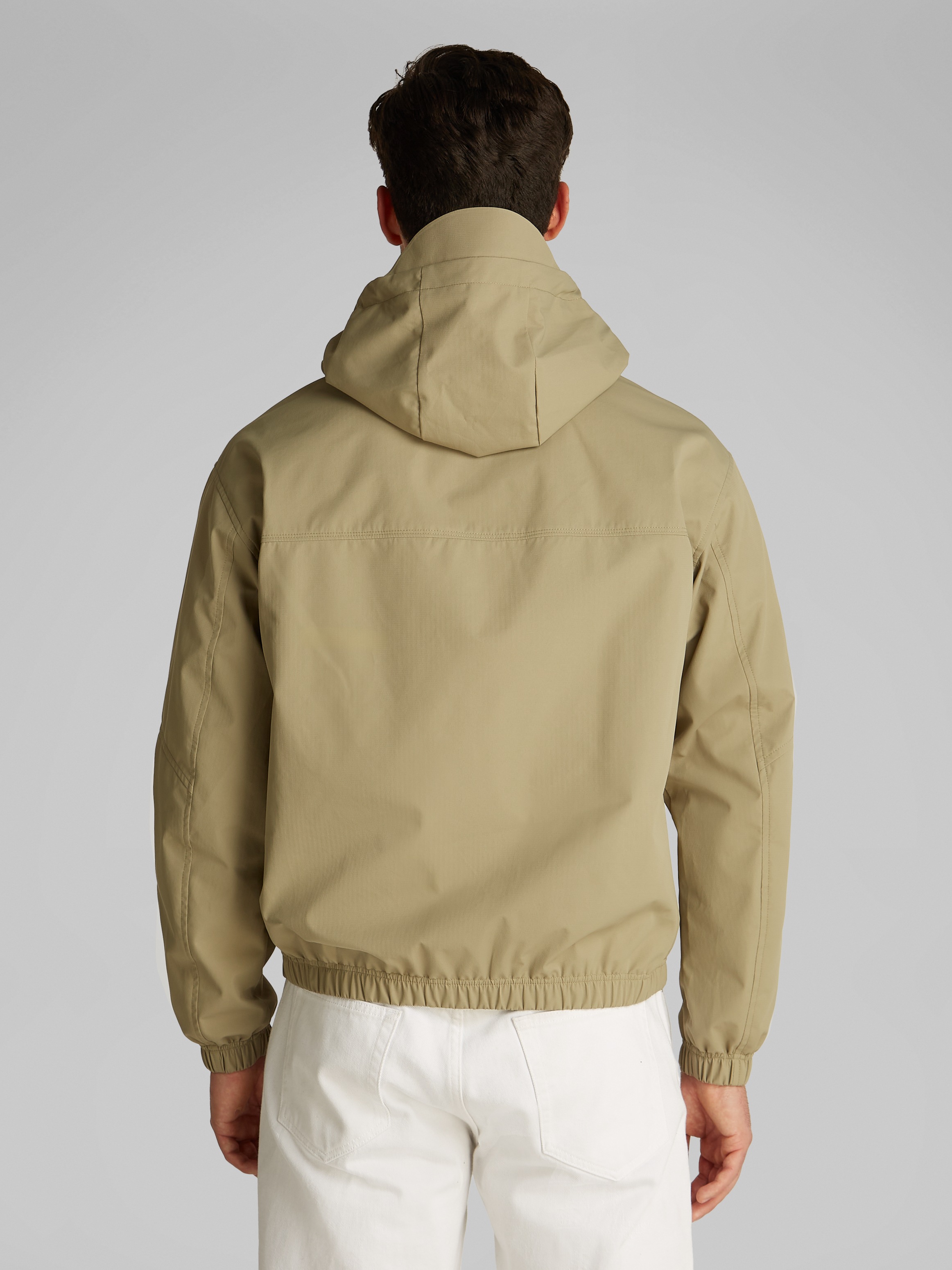 Calvin Klein Jeans Allwetterjacke »TECHNICAL JACKET«, mit Kapuze, Logodruck, Eingriffstaschen