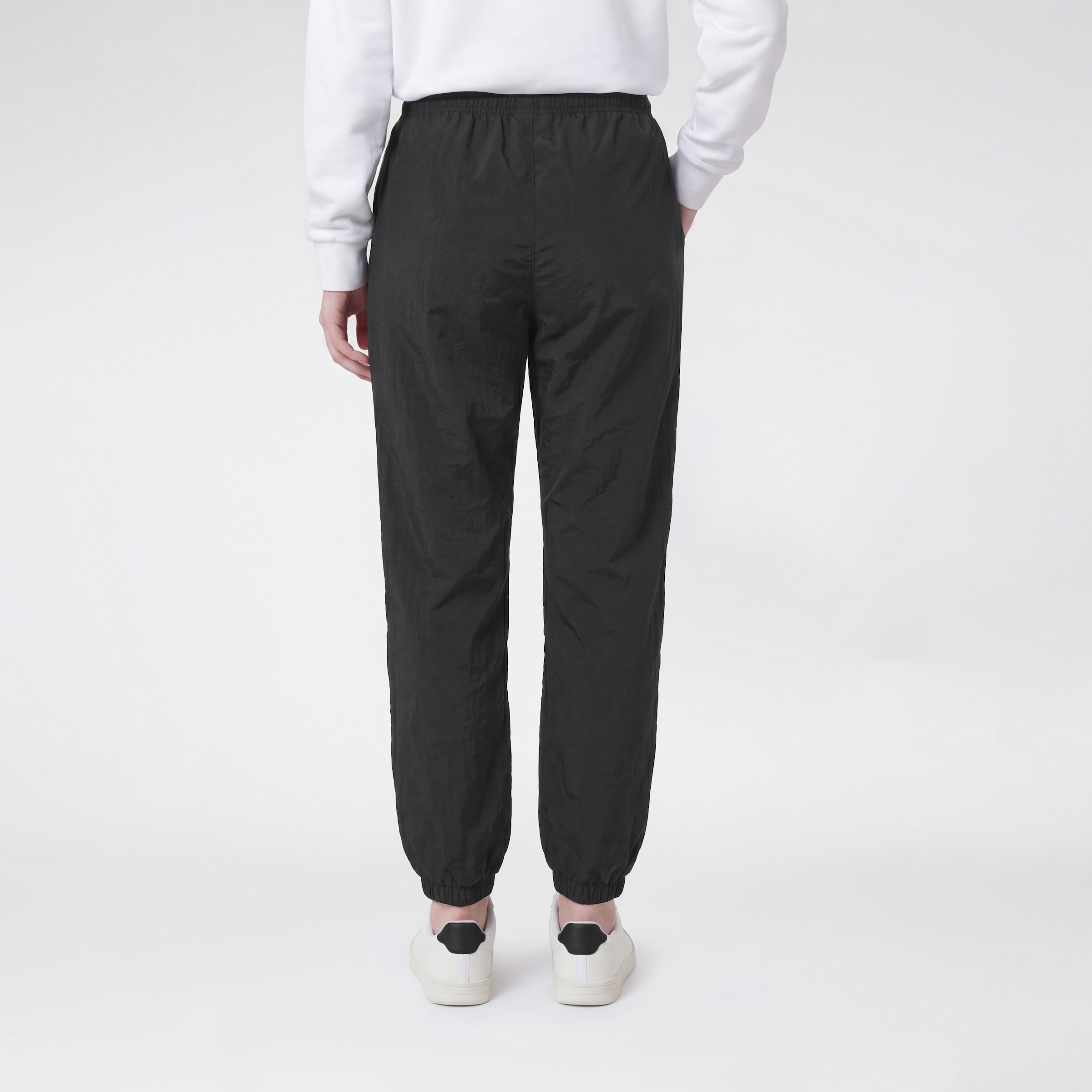 Champion Trainingshose »SPORTWEAR CUFFED PANTS Loose Fit Nylon«  Loose Fit, aus Polyamid, mit Cuffed-Design, auch in großen Größen