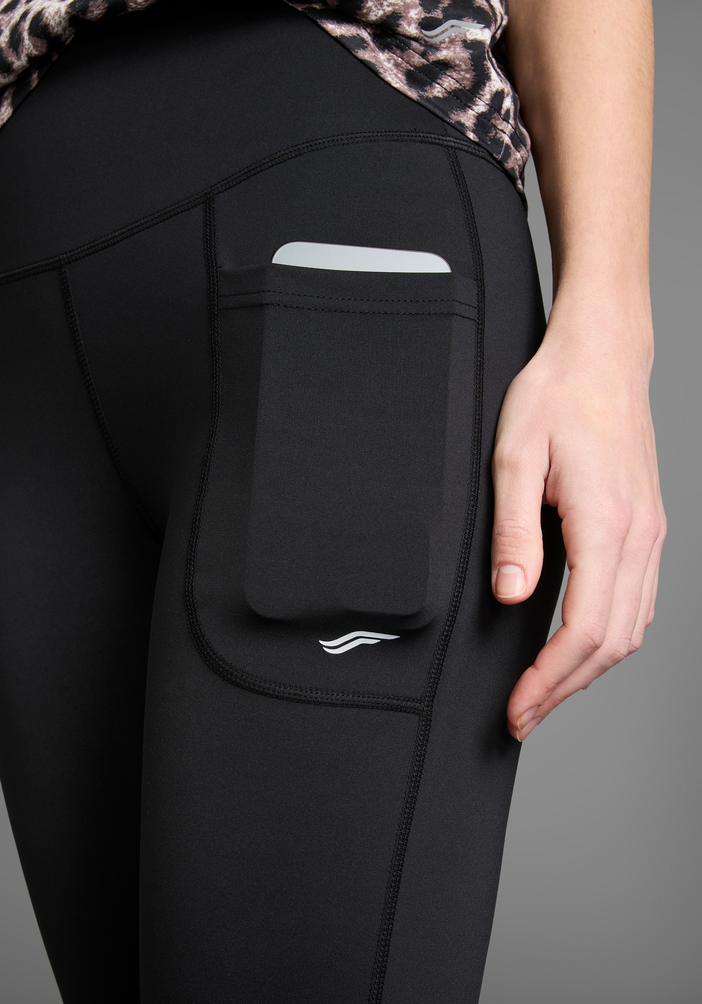 FAYN SPORTS Caprileggings, mit Figur formenden Nähten und hohem Bund