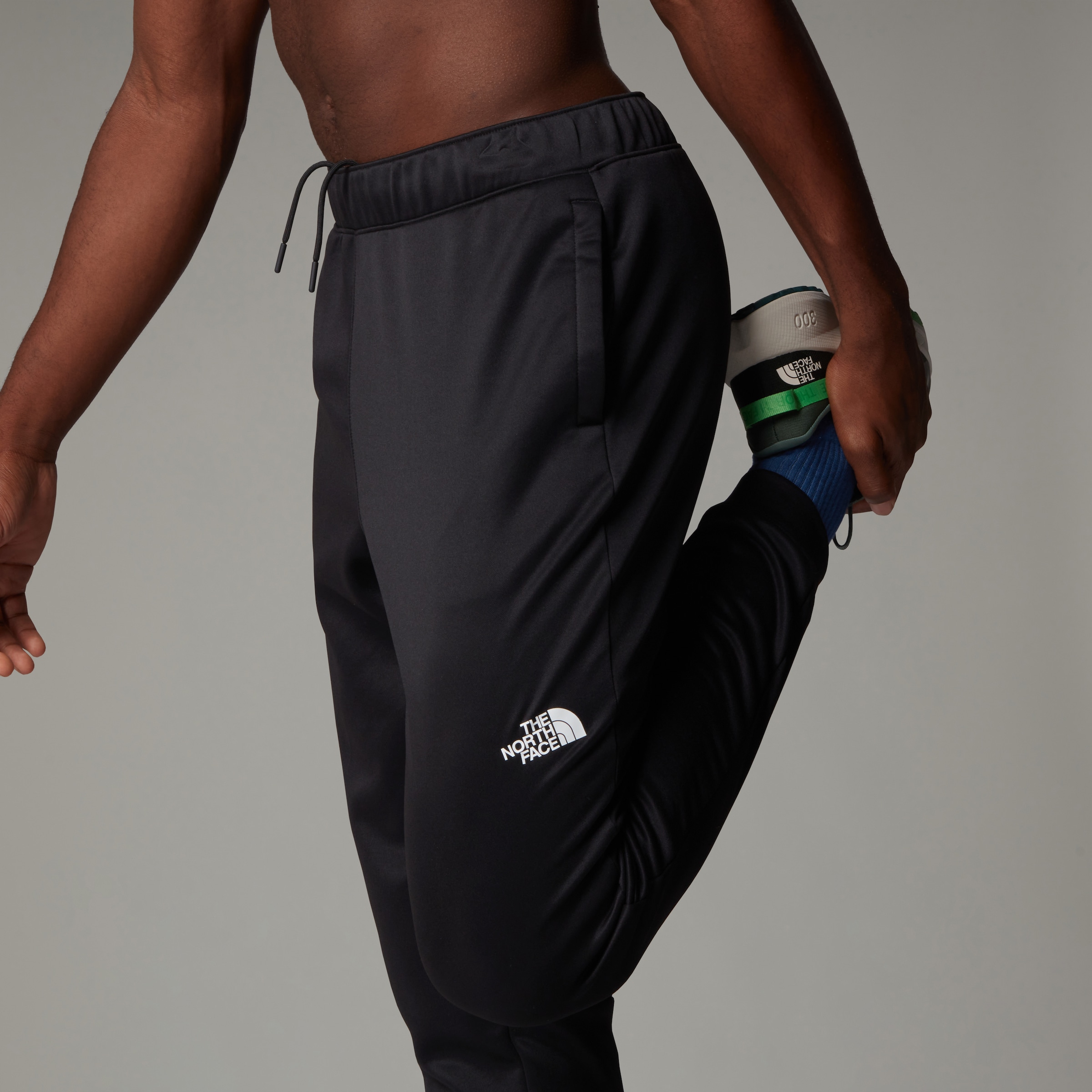 The North Face Trainingshose »Reaxion Fleece Jogginghose für Herren«, (1 tlg.)