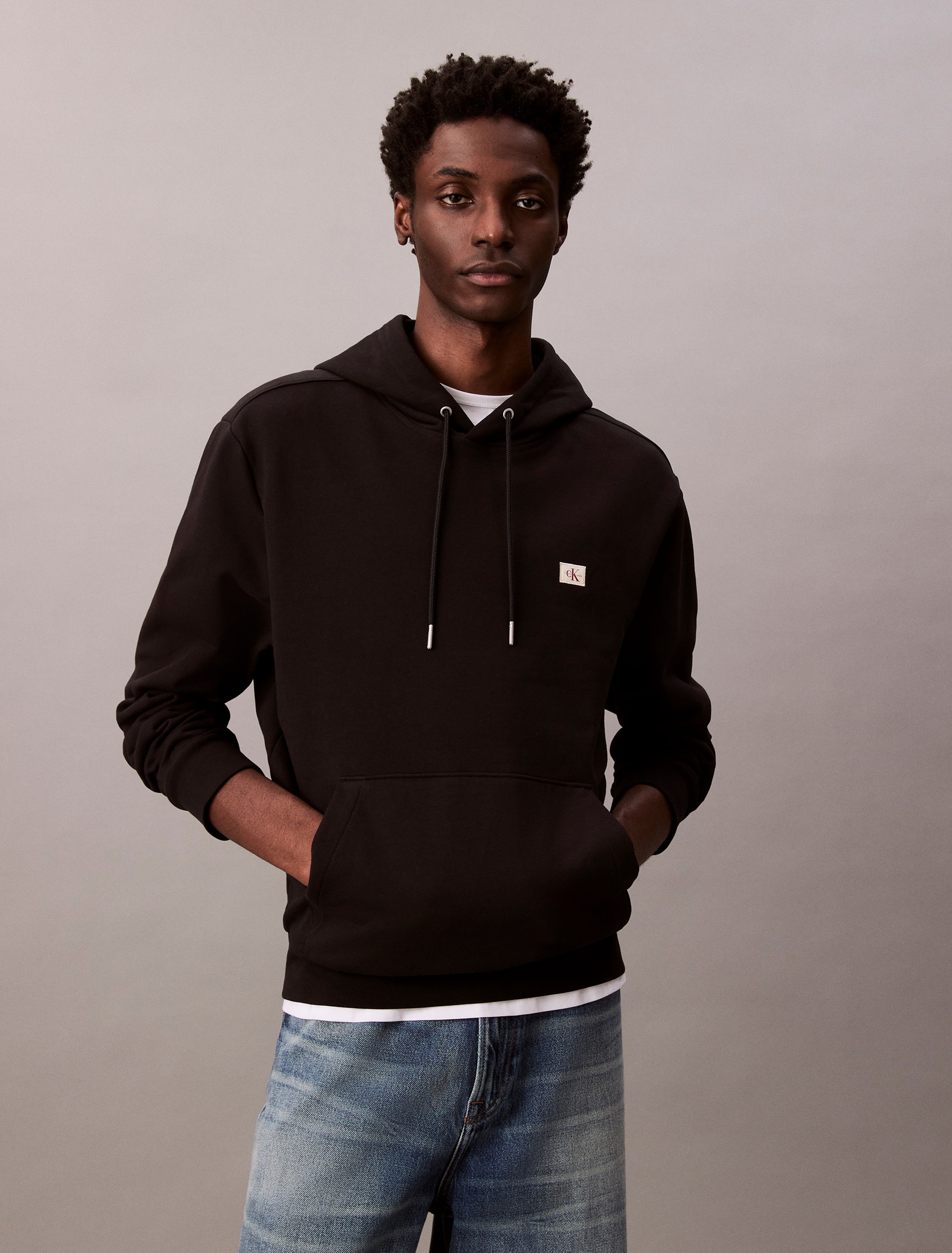 Calvin Klein Jeans Kapuzensweatshirt »400GSM TERRY BADGE HOODIE«, Mit Rundhalsausschnitt
