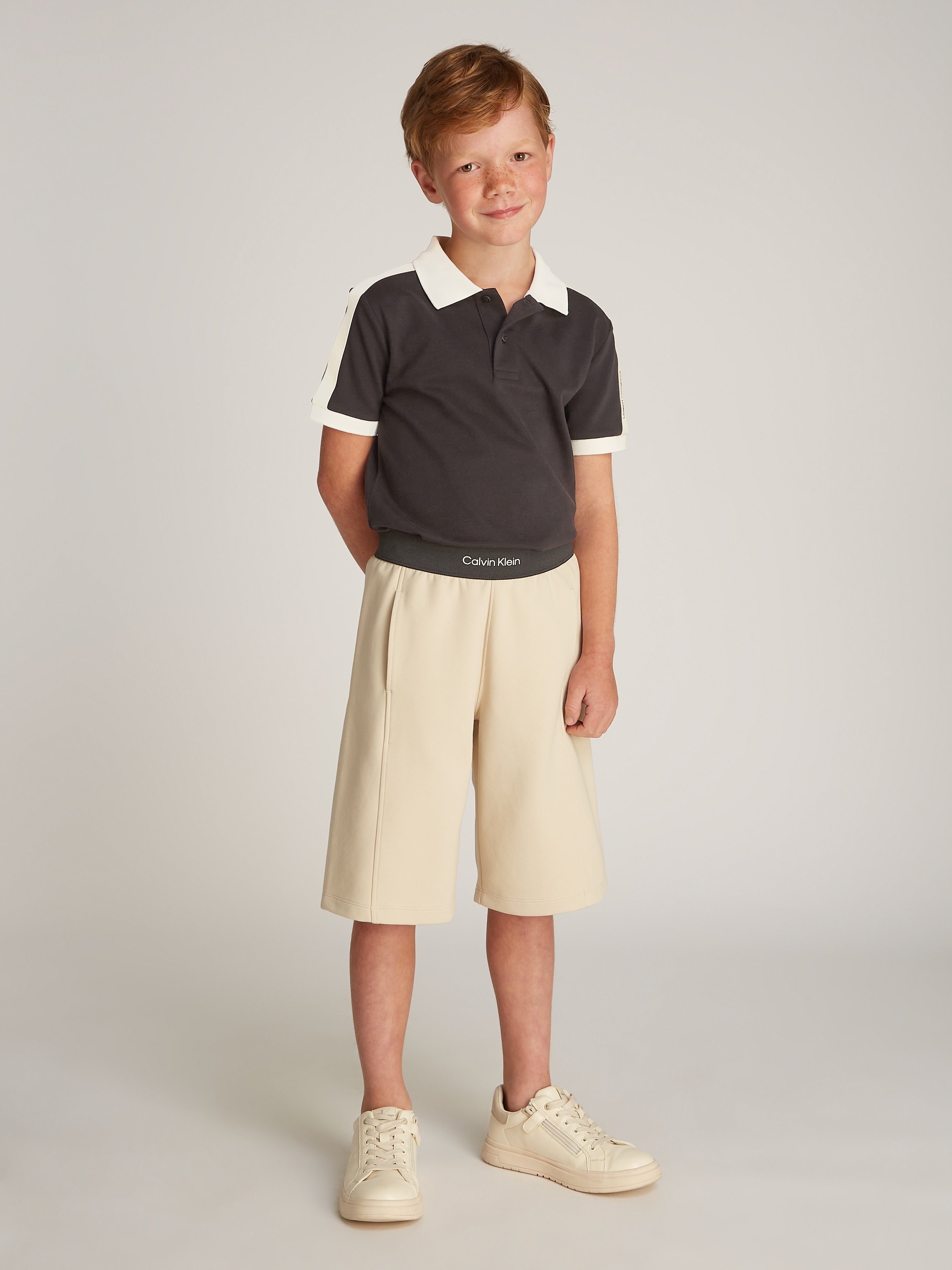 Calvin Klein Jeans Poloshirt »SS POLO PIQUE WITH TAPE«, mit Logoschriftzug