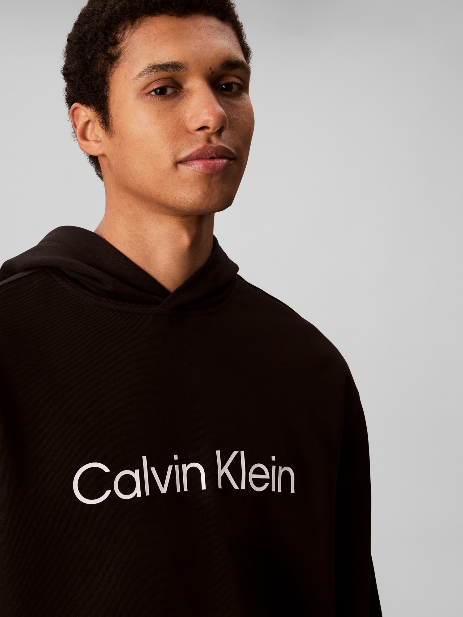 Calvin Klein Kapuzensweatshirt »LS EU STANDARD LOGO 350TERRY PO«, Mit Rundhalsausschnitt, regular fit
