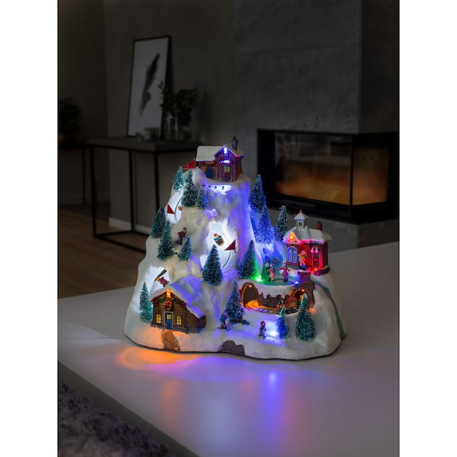 KONSTSMIDE Weihnachtsfigur »Weihnachtsdeko«, (1 St.), LED Szenerie Skipiste,  m. Animation + 8 klassischen Weihnachtsliedern kaufen bei OTTO