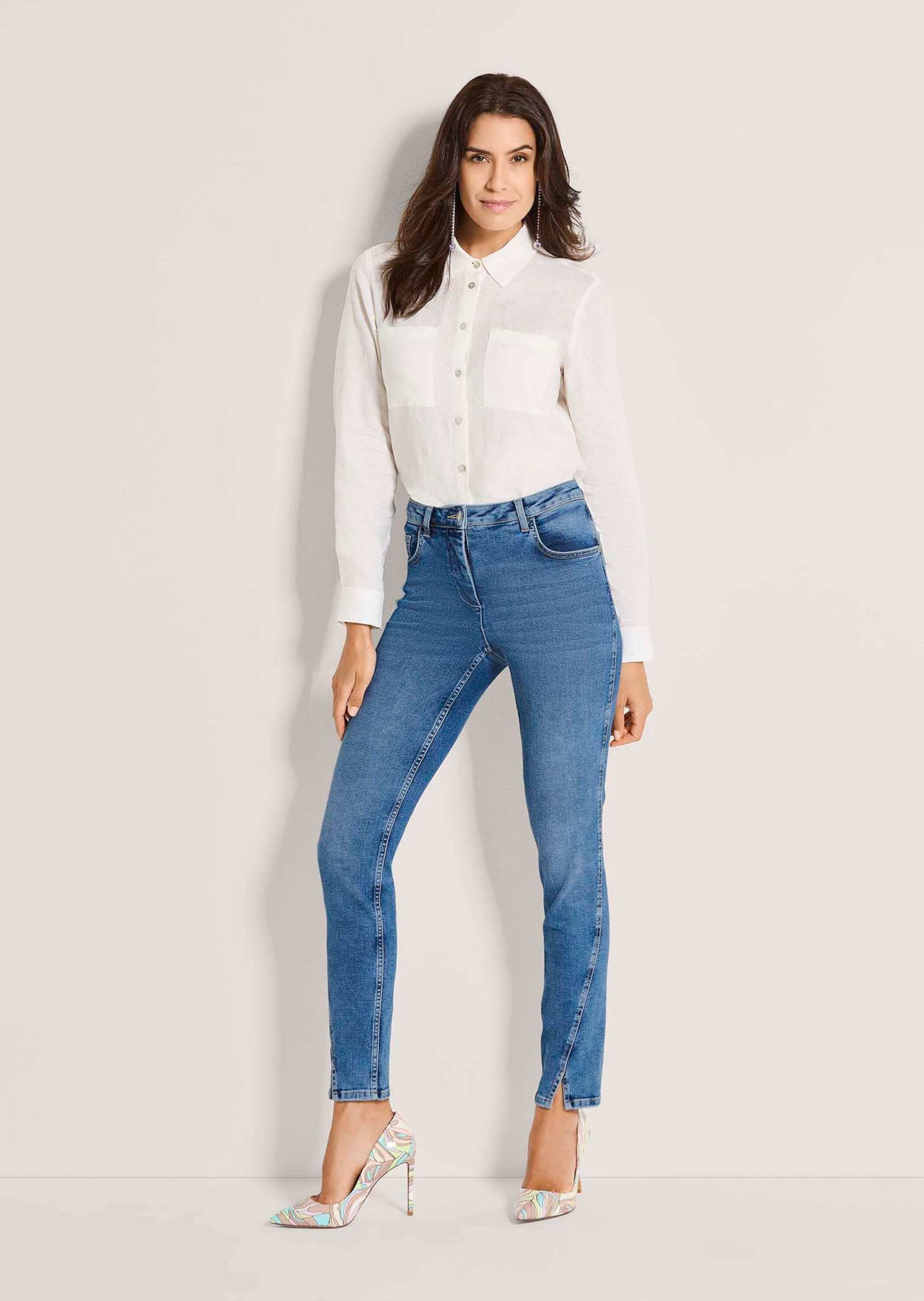 MADELEINE Regular-fit-Jeans »Jeans Skinnyjeans mit asymmetrischer Naht« Schlitz