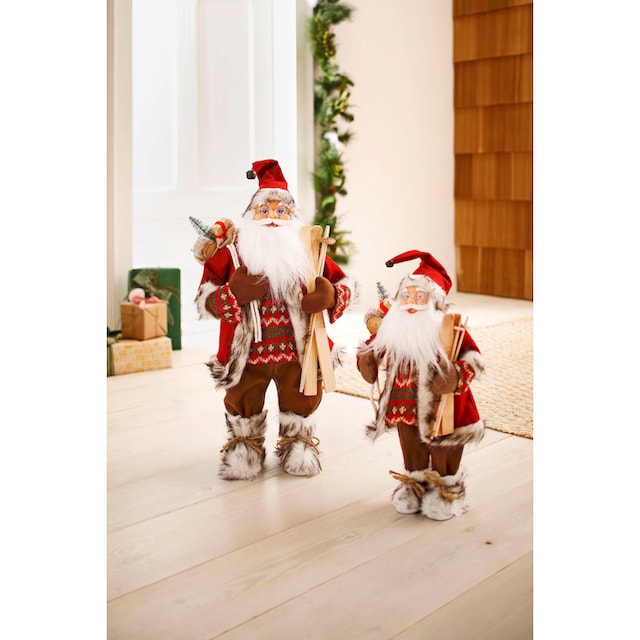 HOSSNER - HOMECOLLECTION Weihnachtsmann »Santa mit Skiern unter dem Arm und  Geschenken«, Weihnachtsdeko, Dekofigur, Weihnachtsfigur online bei OTTO