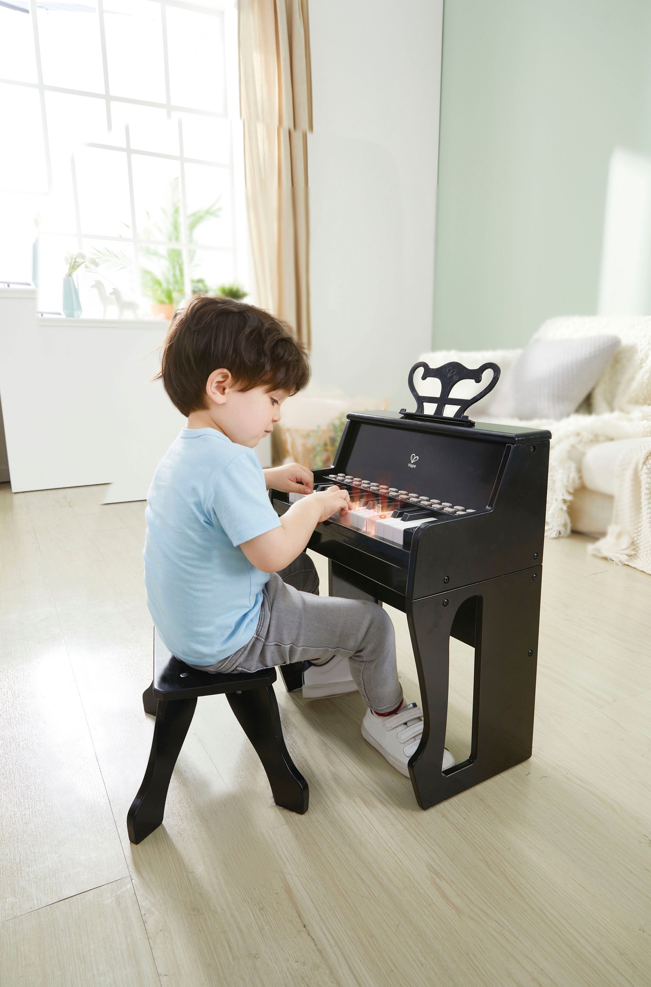 Hape Spielzeug-Musikinstrument »Leuchttasten-Piano mit Hocker«