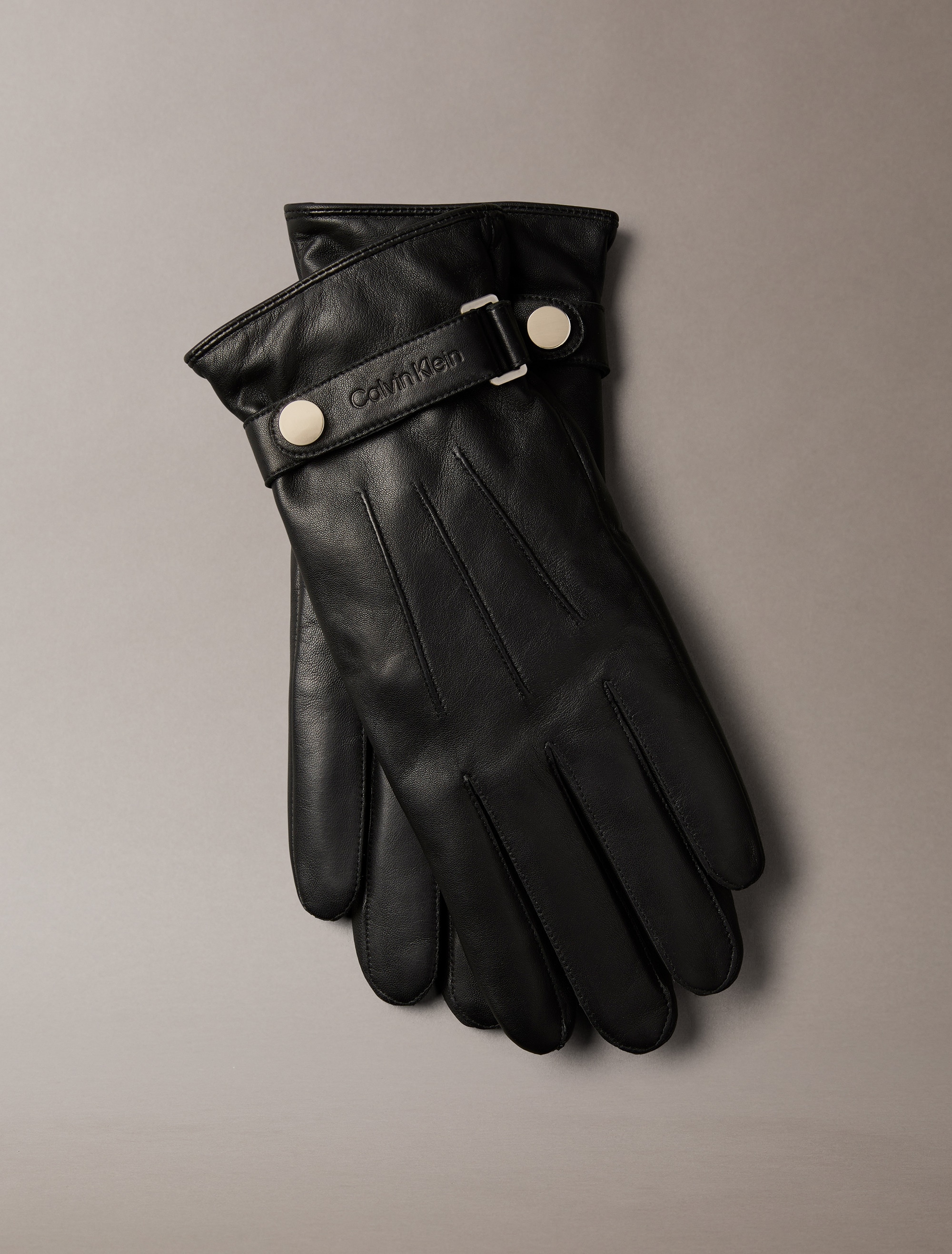 Calvin Klein Lederhandschuhe »LOGO STRAP SMOOTH LEATHER GLOVES«, Perfekt für den Alltag