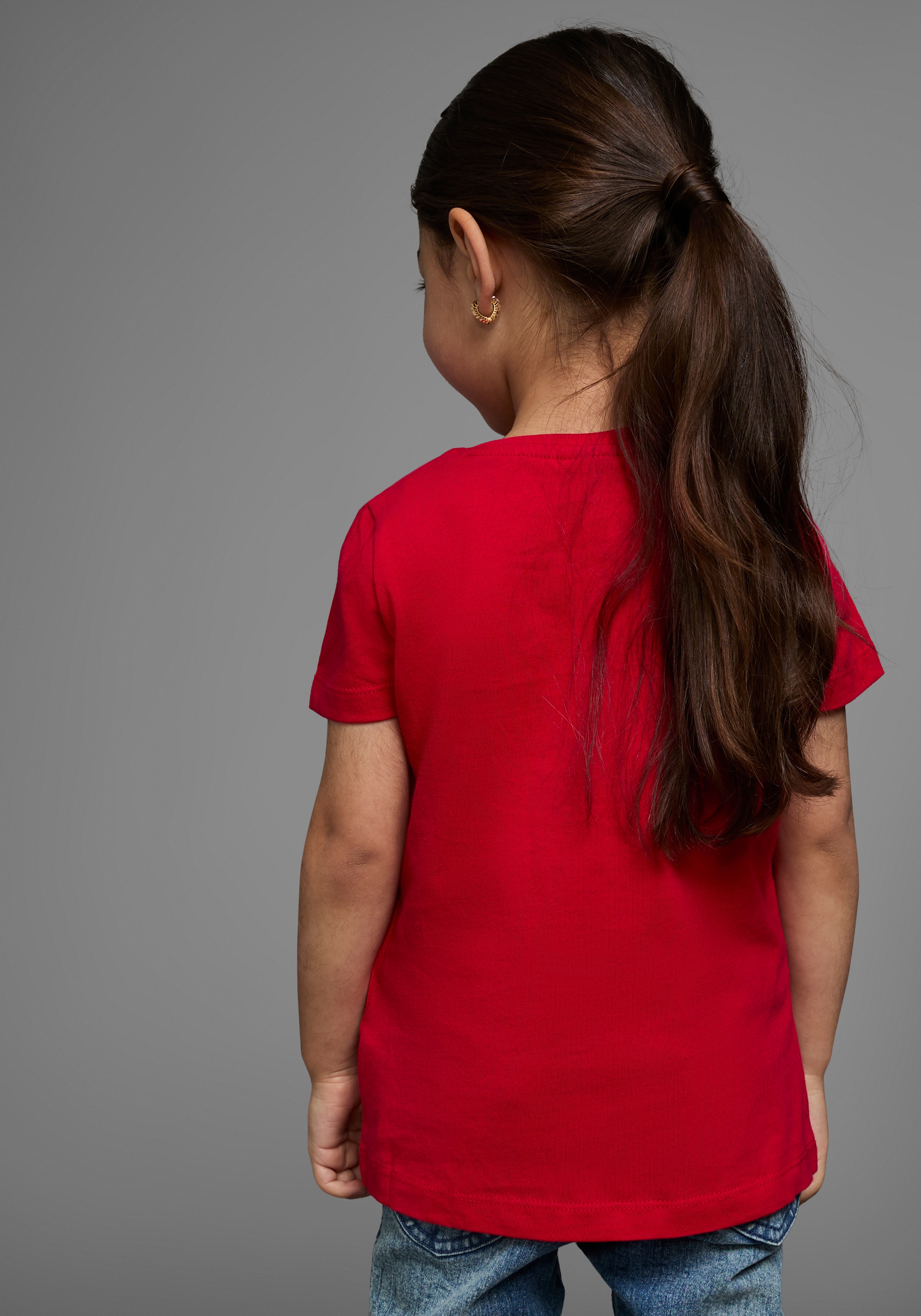 KIDSWORLD T-Shirt »Mit Einhorn-Druck und Glitzereffekten«, Kurzarm, hüftlange Passform, mit stylischem Print