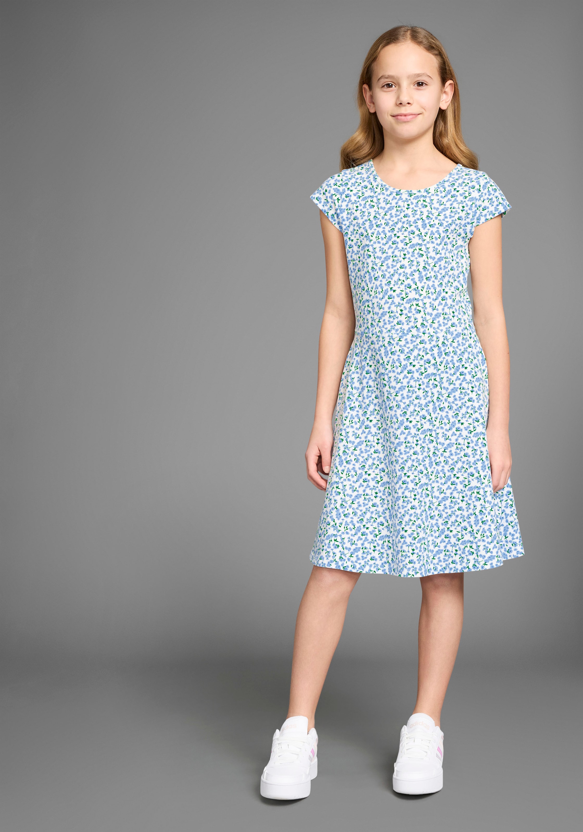 Kidsworld Mädchen Jerseykleid »Skaterkleid in Allover-Design« Ohne Taschen weich fallendes Jersey-Kleid in blau, Größe 164/170