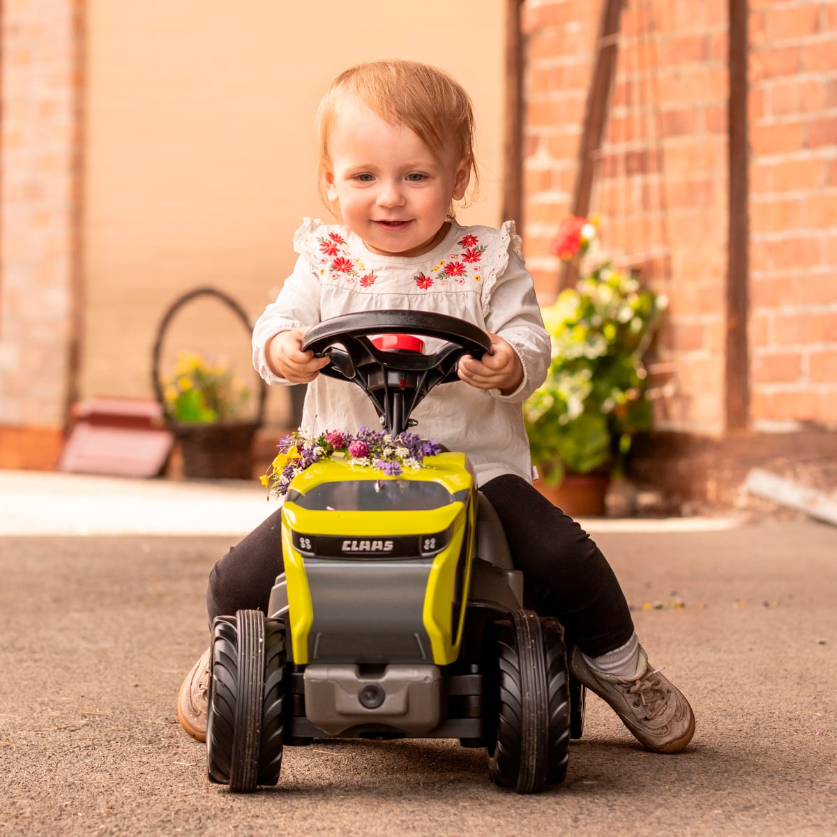 rolly toys® Rutscherauto »rollyMinitrac Claas Xerion«, mit Flüsterreifen und Hupe