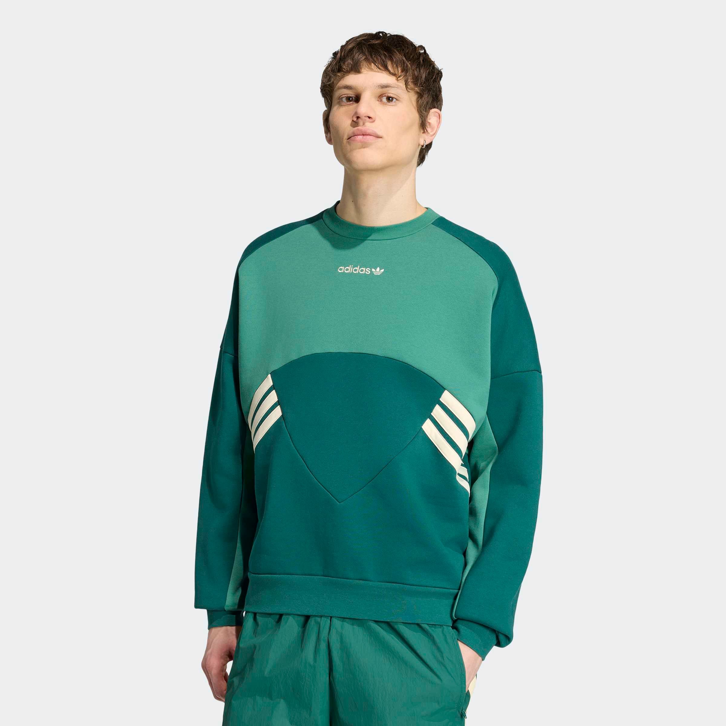 adidas Originals Sweatshirt »MUNICH 93 RUNDHALS«, mit angesetzten Bündchen an Ärmel- und Rumpfabschluss
