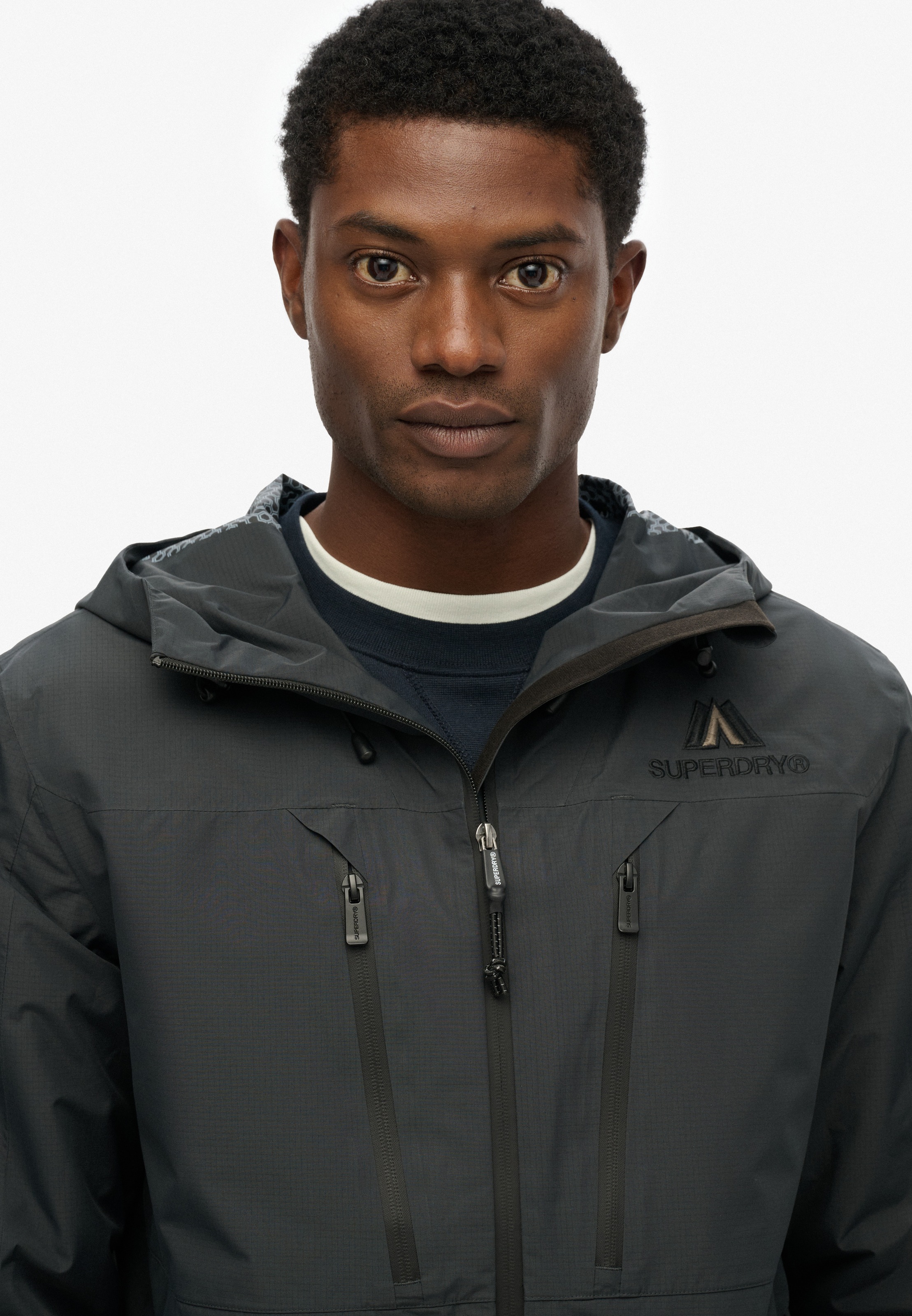 Superdry Outdoorjacke »WATERPROOF JACKET«, mit Kapuze, Wasserdicht (Säule wird nachgereicht)