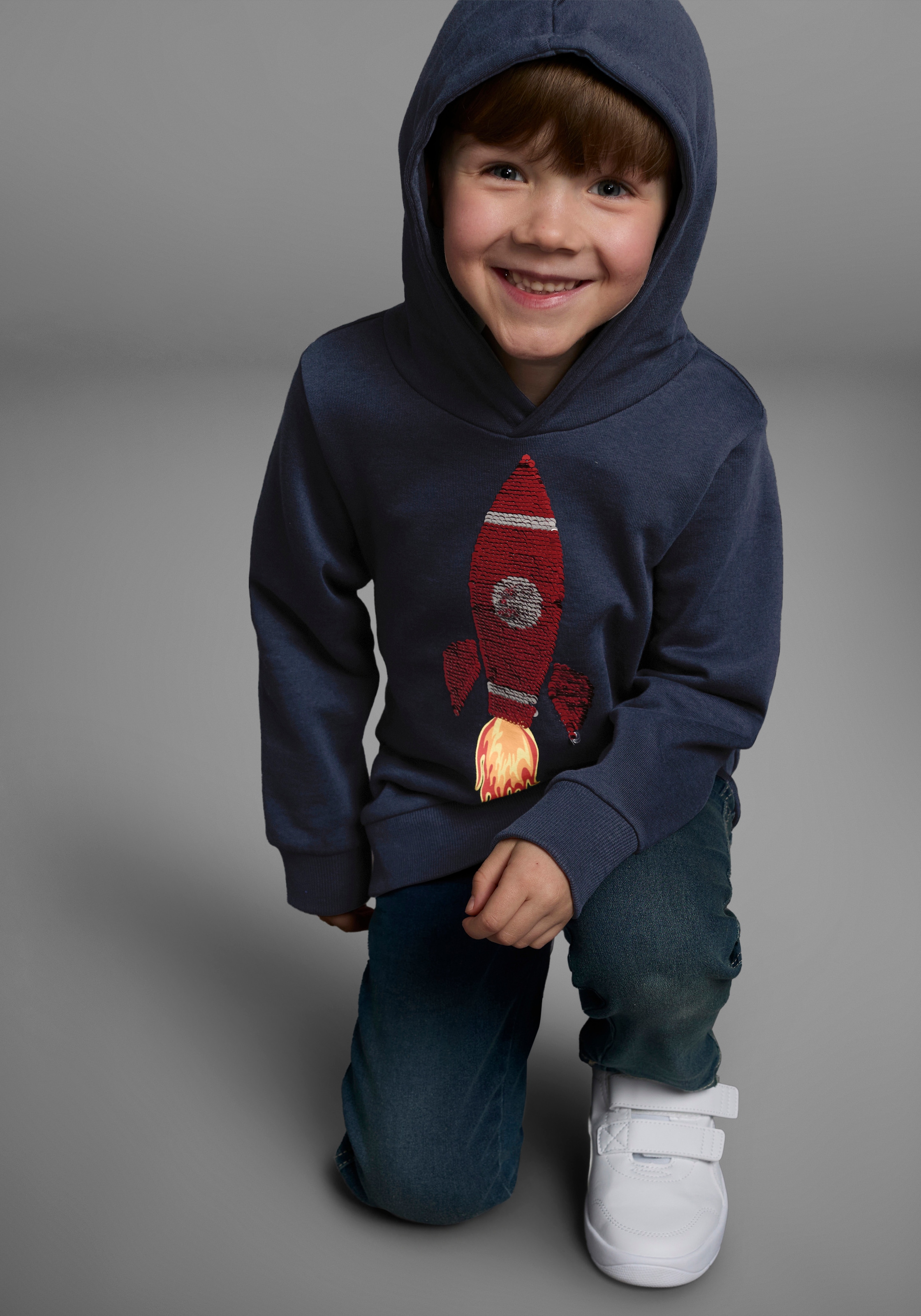 KIDSWORLD Kapuzensweatshirt »Rakete - Wendepaillette«, lange Ärmel, Basic-Passform, aus Baumwolle, mit Rippbündchen
