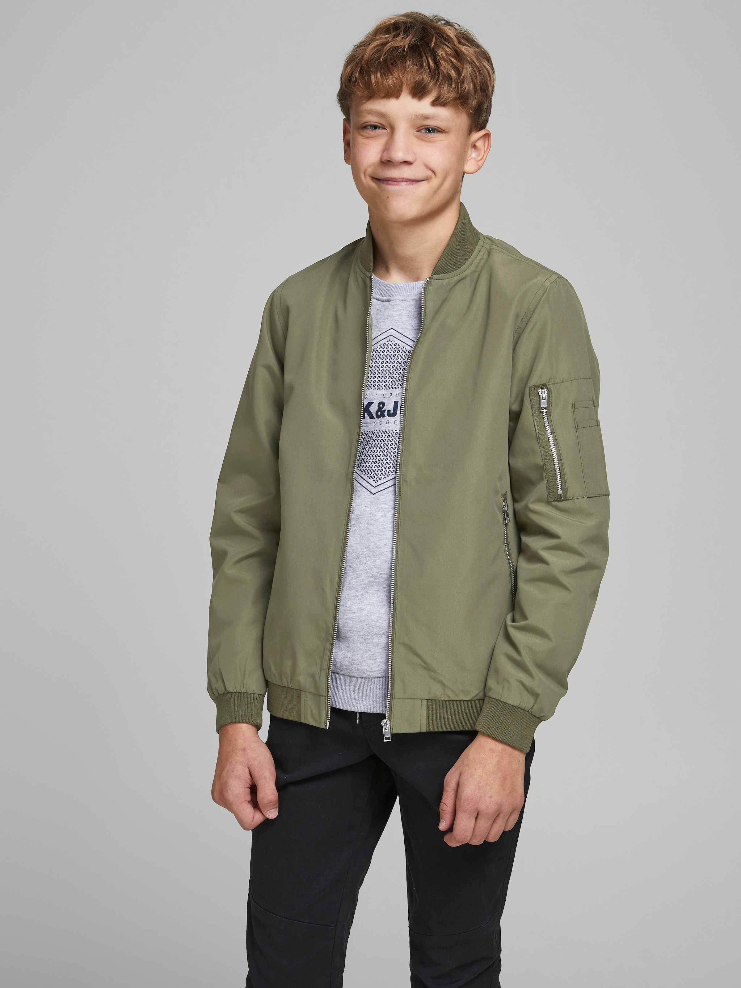 Jack & Jones Junior Bomberjacke »JJERUSH windabweisend und pflegeleicht« ohne Kapuze unifarben, modisch, regular fit, Web, Stehkragen