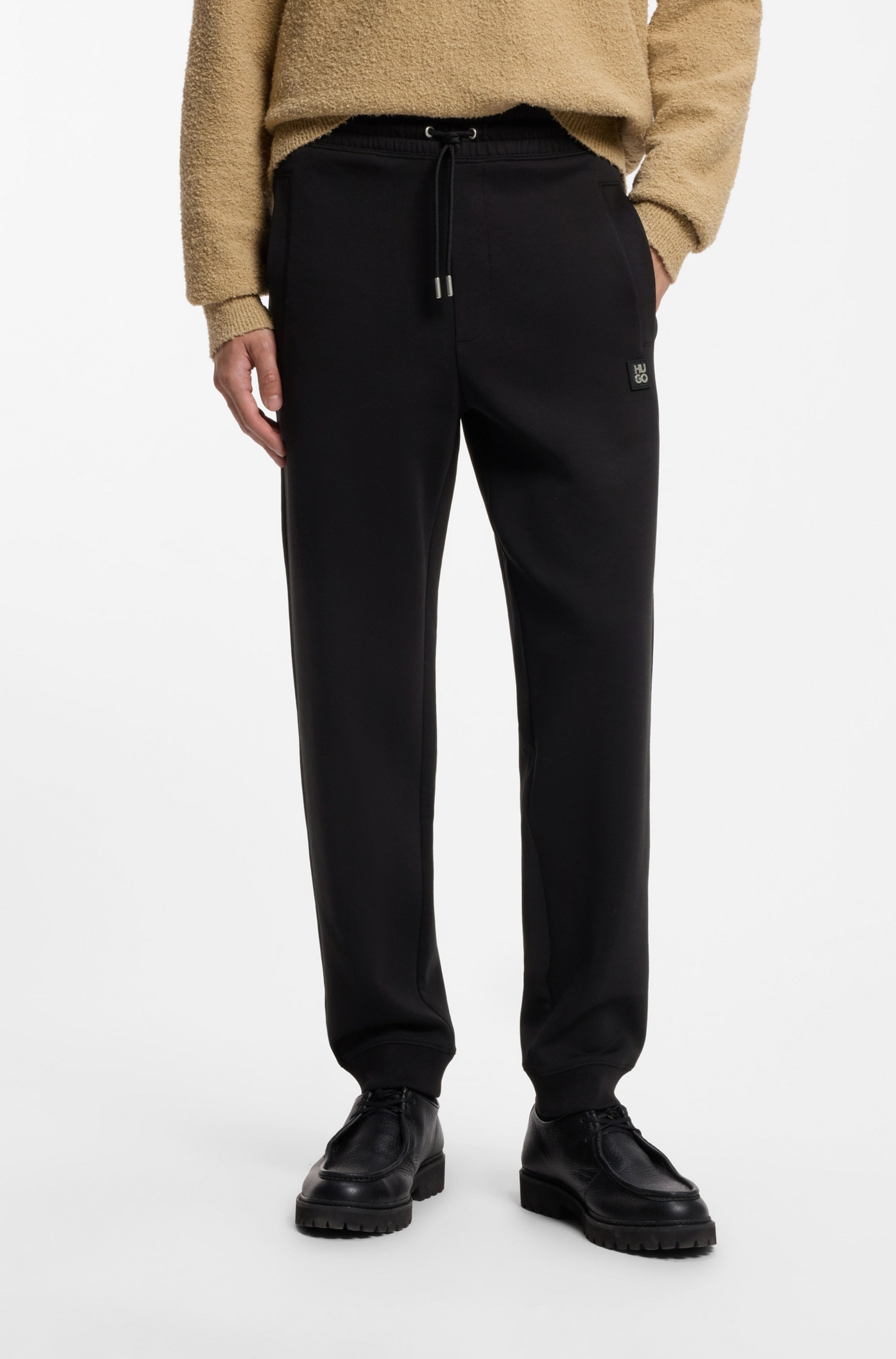 HUGO Sweathose »Dimacs Metal Logo«  elastischer Bund mit Kordel, Relaxed Fit, Premium Interlock
