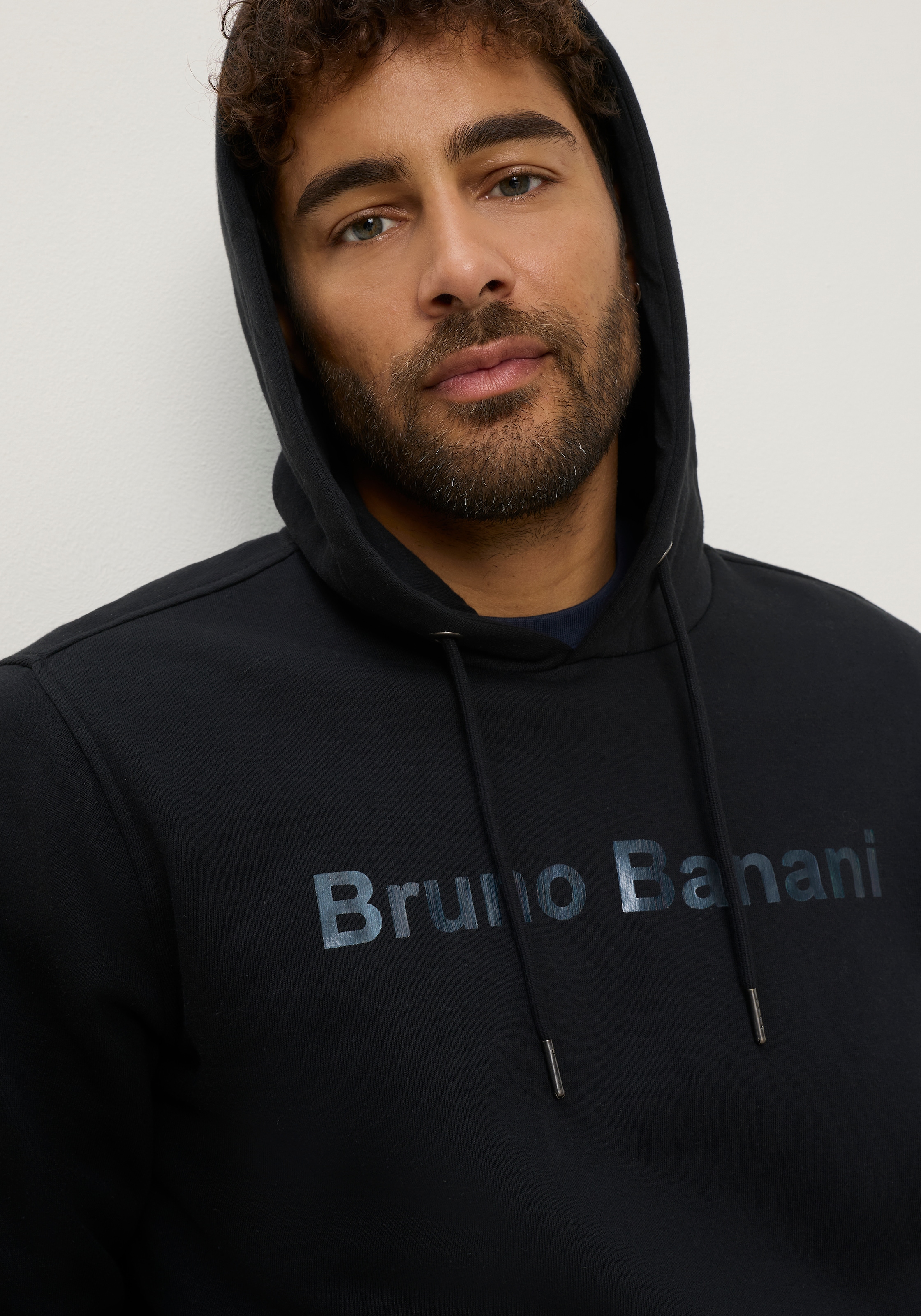 Bruno Banani Kapuzensweatshirt , Ausdrucksstarker Print trifft auf lässigen Komfort
