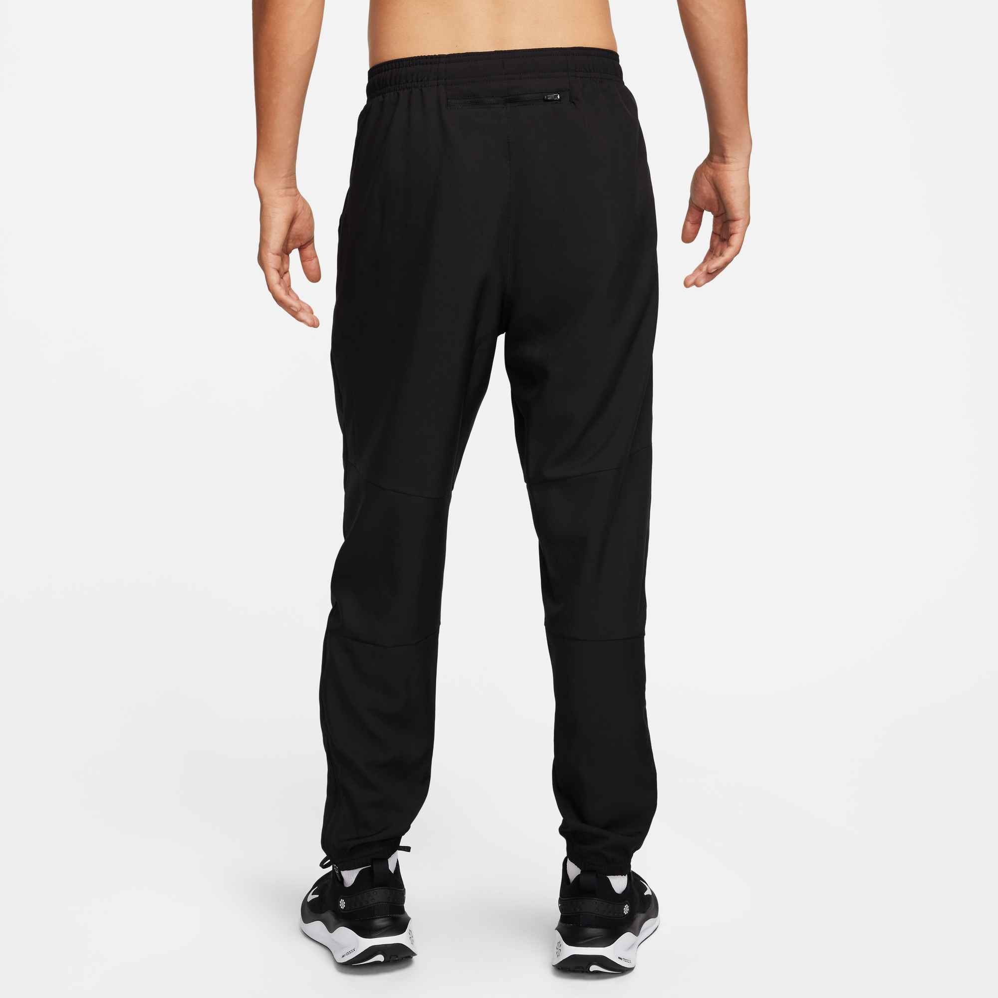 Nike Laufhose »M NK DF CHALLENGR WVN PANT«  leichtes Material, atmungsaktiv, mit Bündchen und Reißverschluss