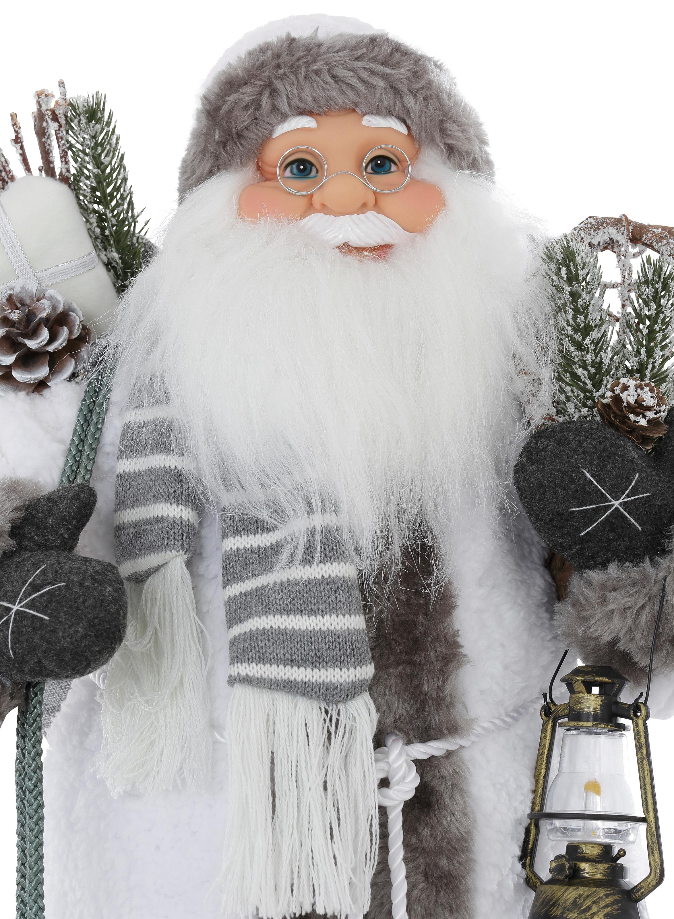 HOSSNER - HOMECOLLECTION Weihnachtsmann »Santa mit weißem Mantel und Laterne«, Weihnachtsdeko