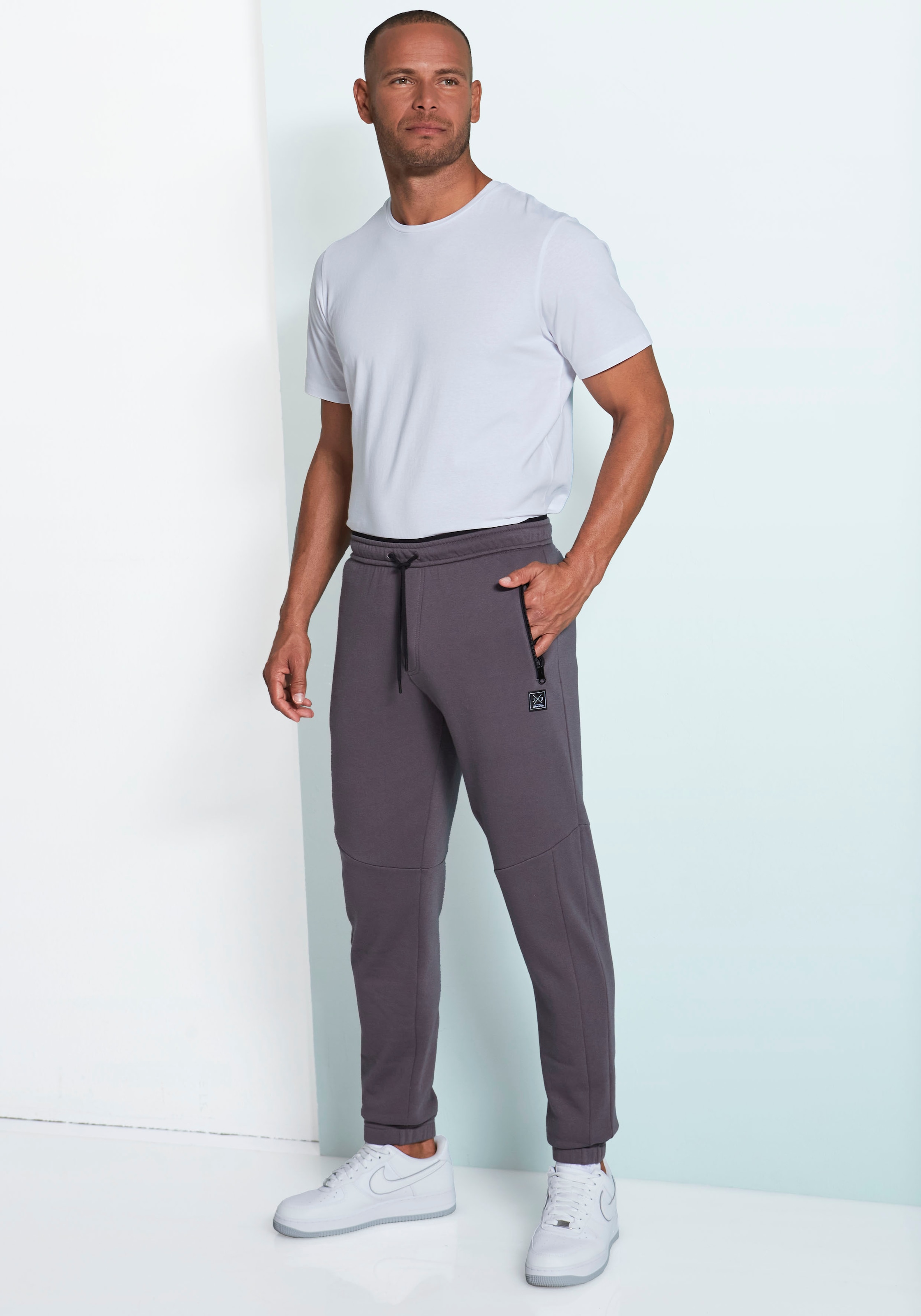 John Devin Sweathose  Jogginghose mit seitlichen Taschen und Bindeband aus Baumwoll-Mix