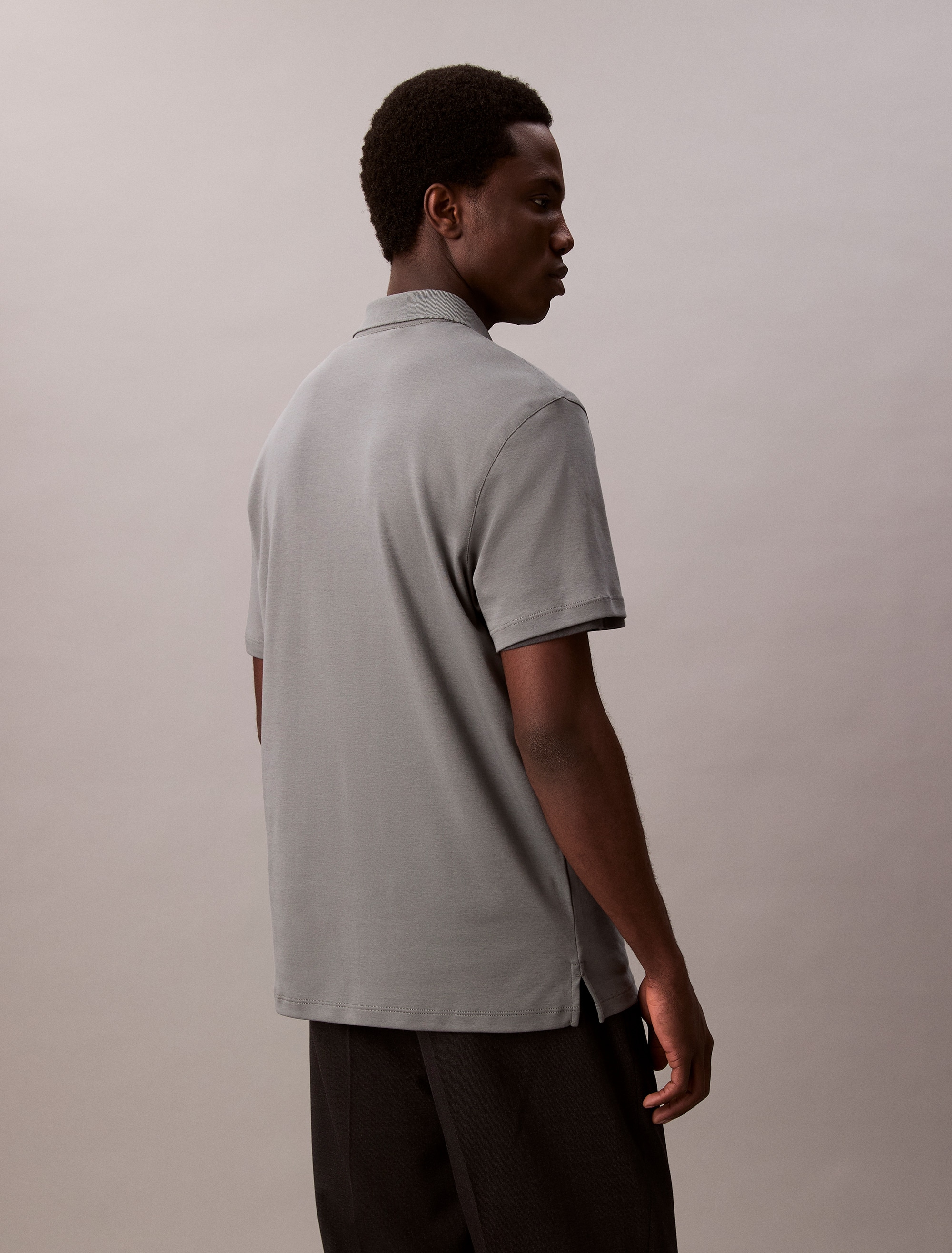 Calvin Klein Poloshirt »SS SUPIMA CHEST EMB POLO«, Mit Rundhalsausschnitt