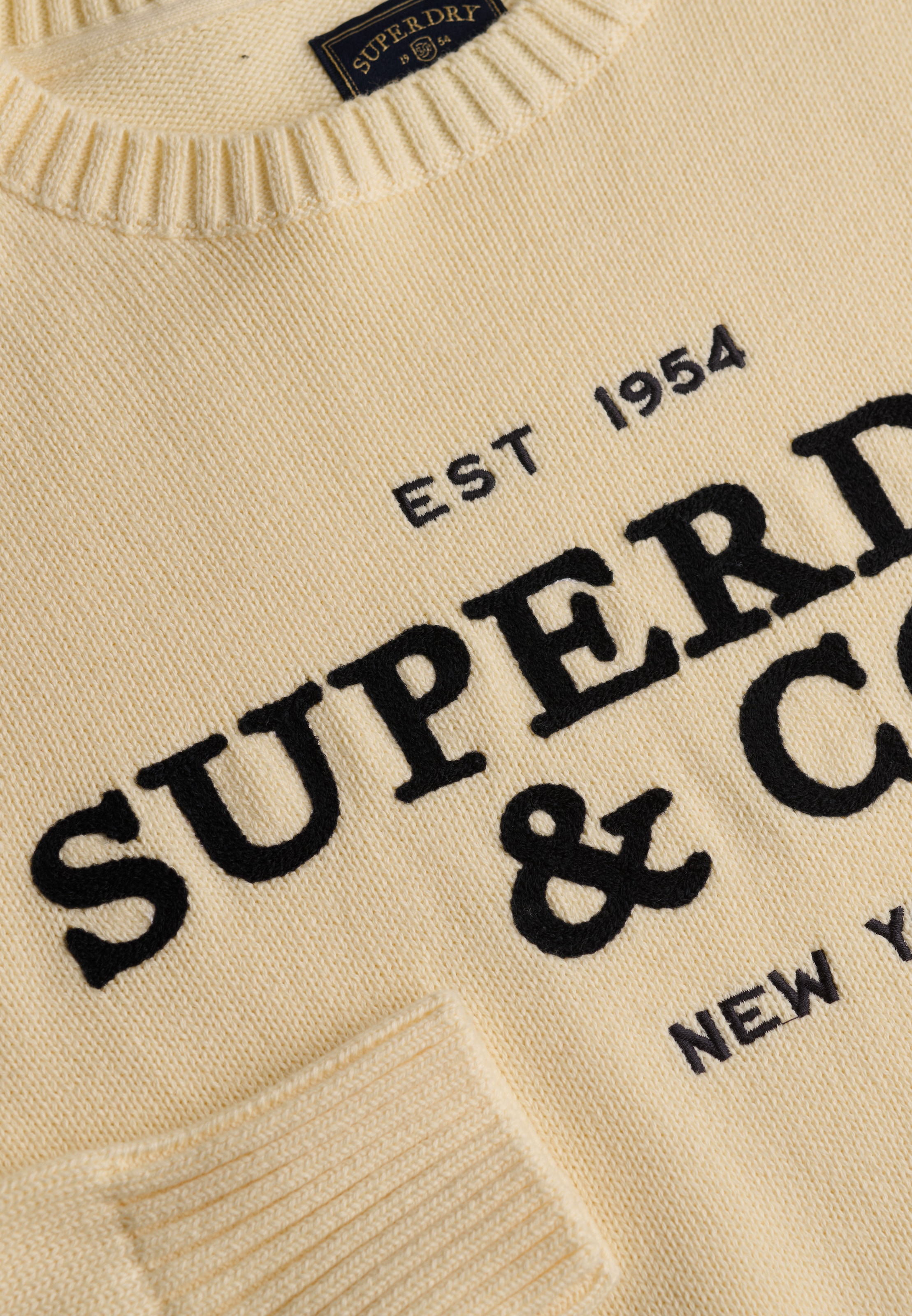 Superdry Strickpullover »HERITAGE GRAPHIC JUMPER« Baumwolle, mit hochwertiger Stickerei
