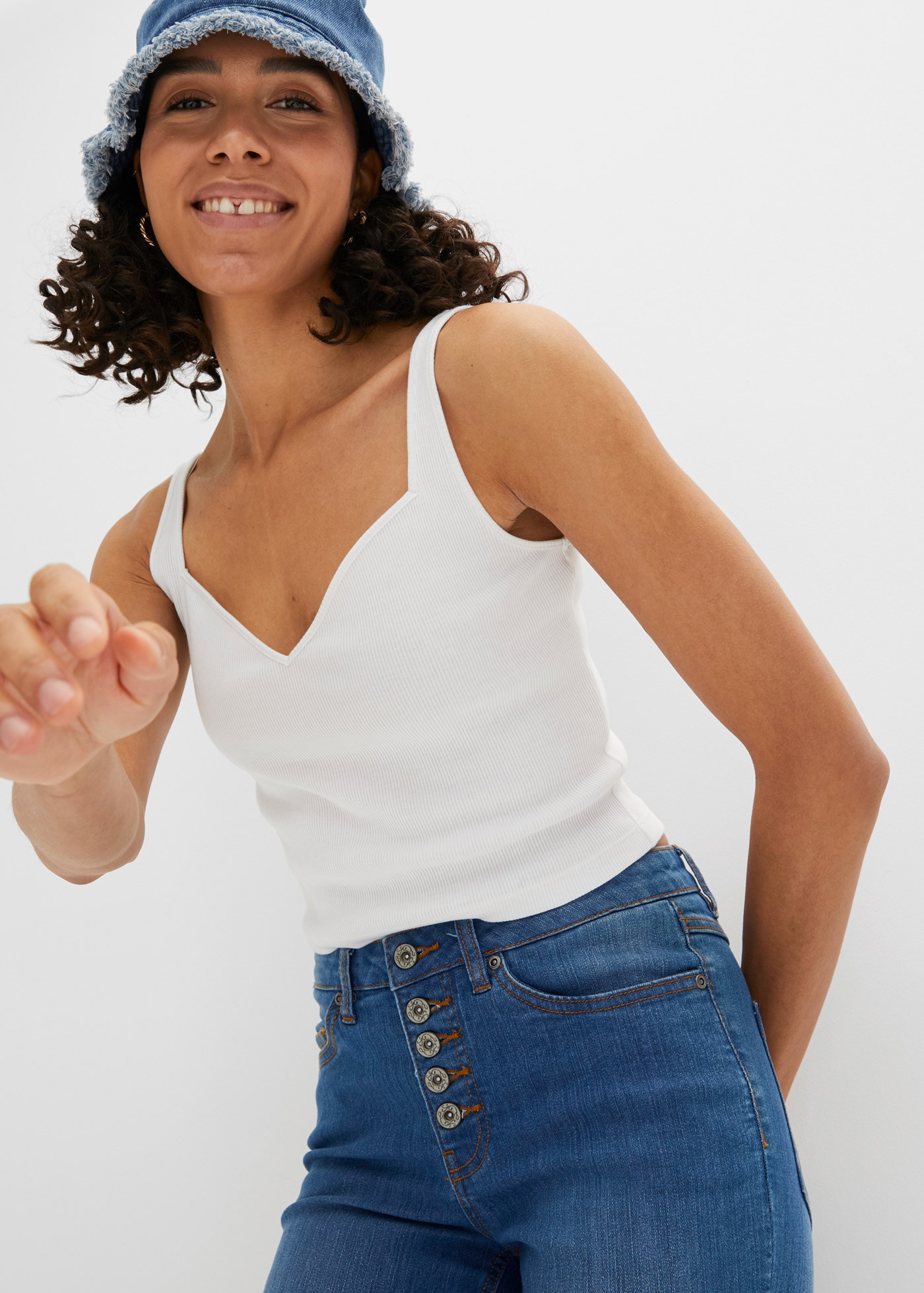 bonprix Schlagjeans Schlagjeans mit offenem Saumabschluss