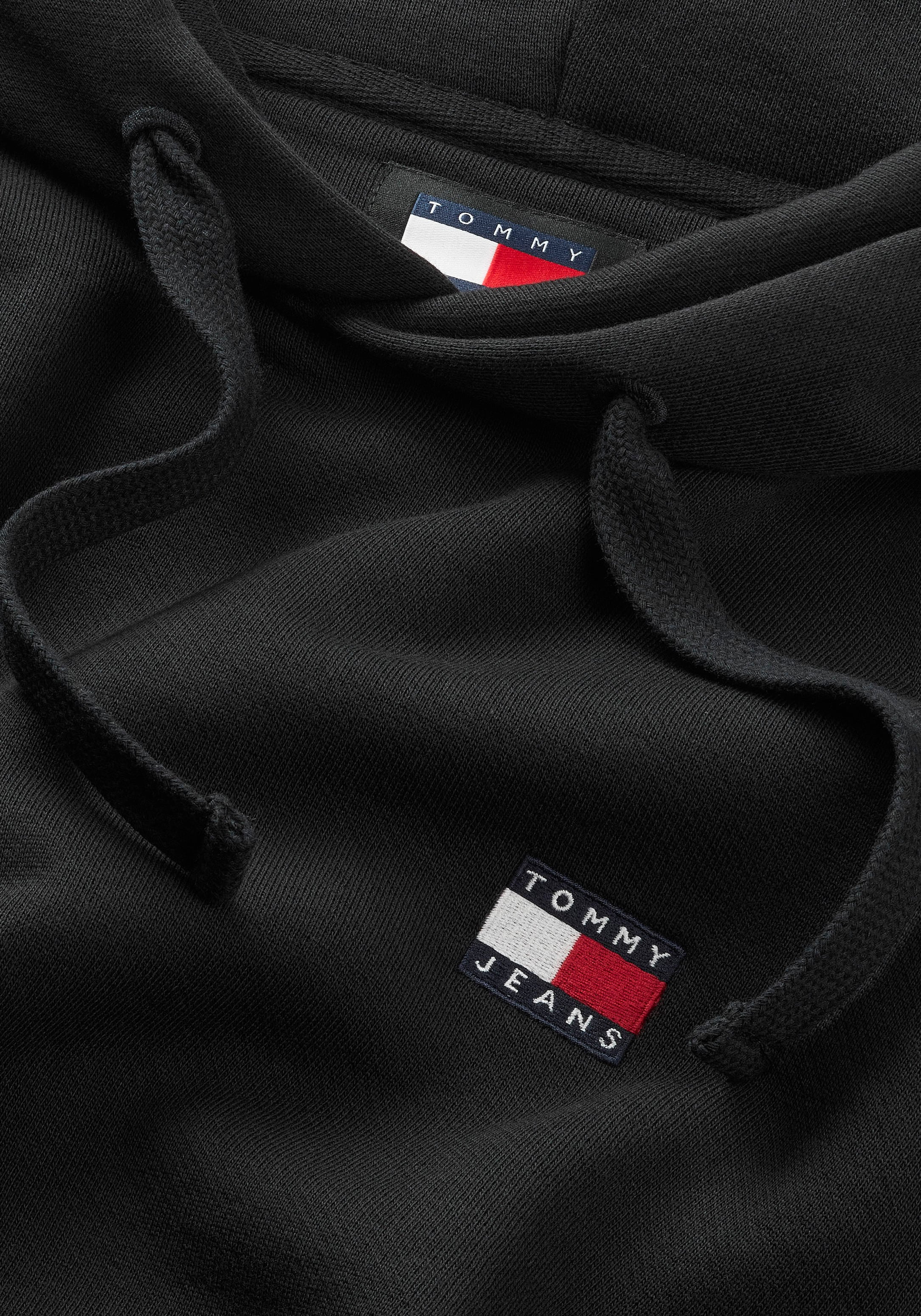 Tommy Jeans Plus Kapuzensweatshirt »TJM REG BADGE HOODIE EXT«, mit wärmend weicher Innenseite