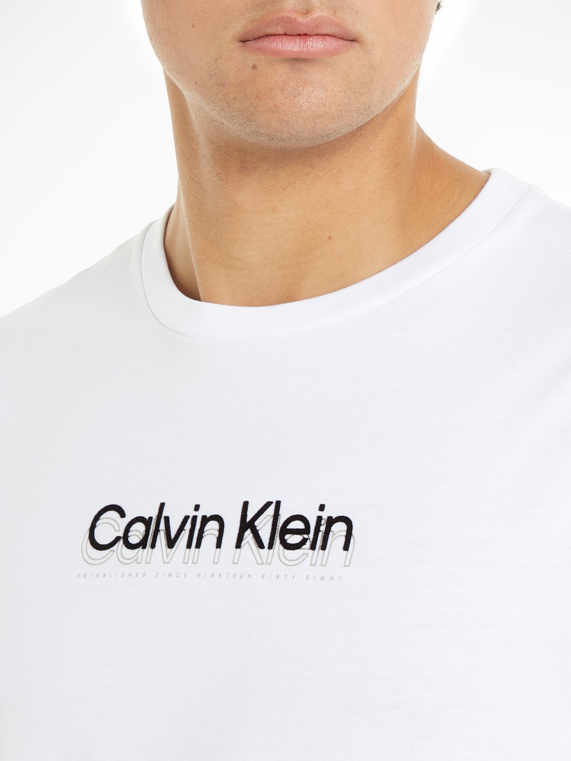 Calvin Klein T-Shirt »FLOCK LOGO T-SHIRT«, mit Logoschriftzug