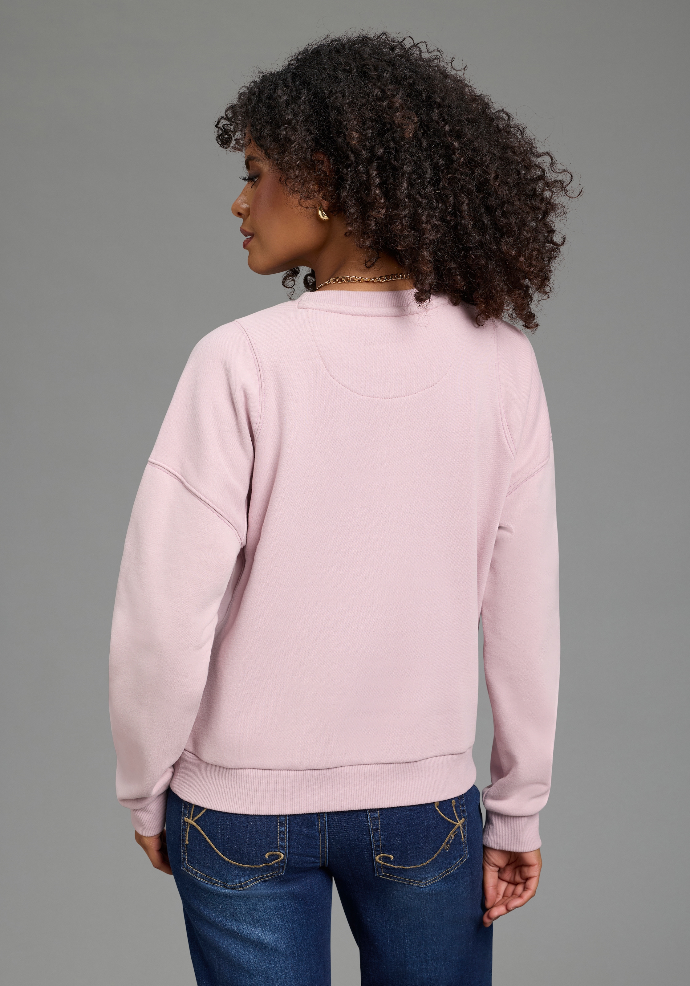 KangaROOS Sweatshirt , mit Druck als Applikation, weite Passform, hüftlange Schnittform
