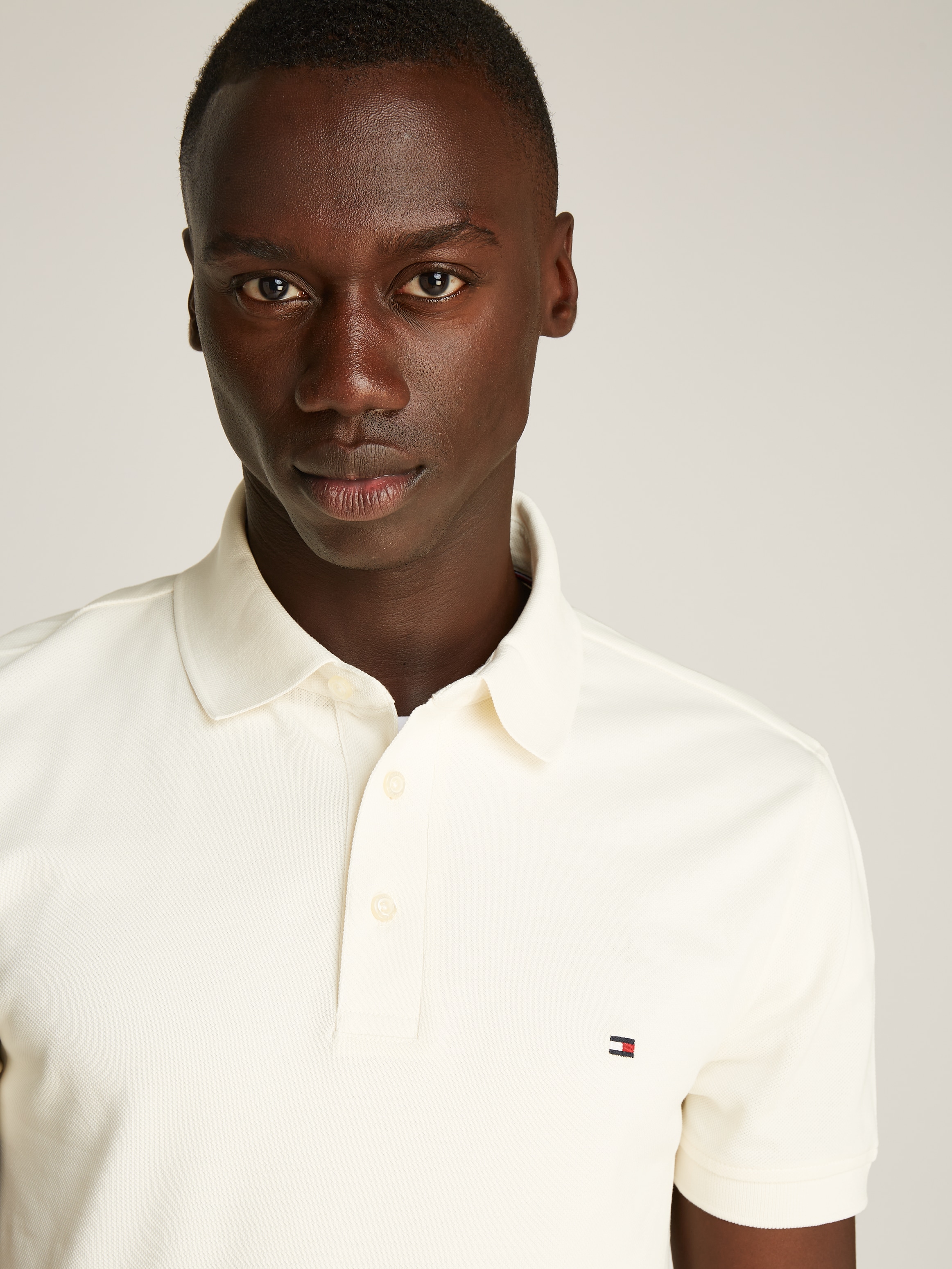 Tommy Hilfiger Poloshirt »1985 SLIM POLO mit Piqué-Struktur und Stickerei«, meliert, casual, slim fit, Baumwollmix, Polokragen