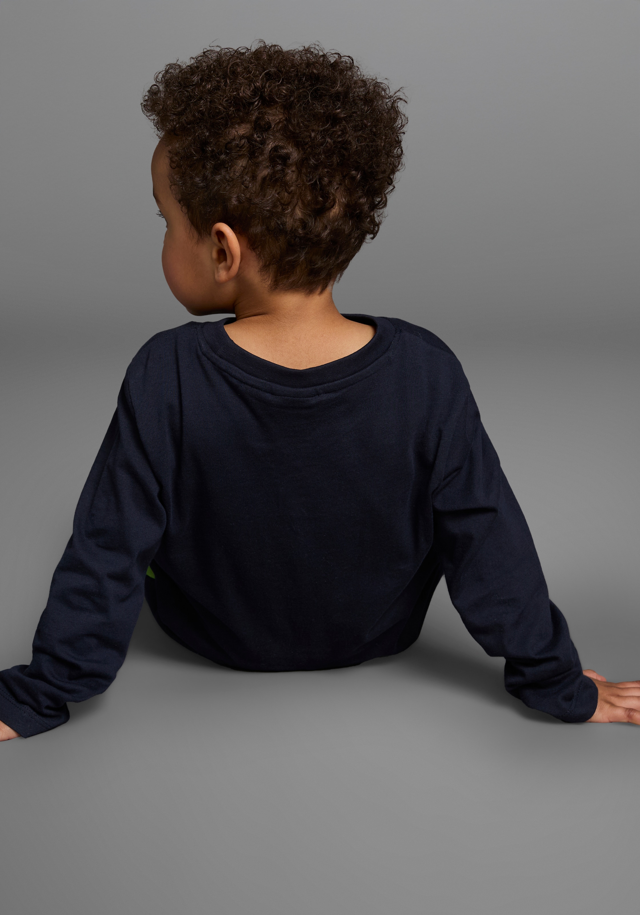 KIDSWORLD Langarmshirt »CURIOUS DINO«, Langarm, Basic-Passform, peppiger Druck