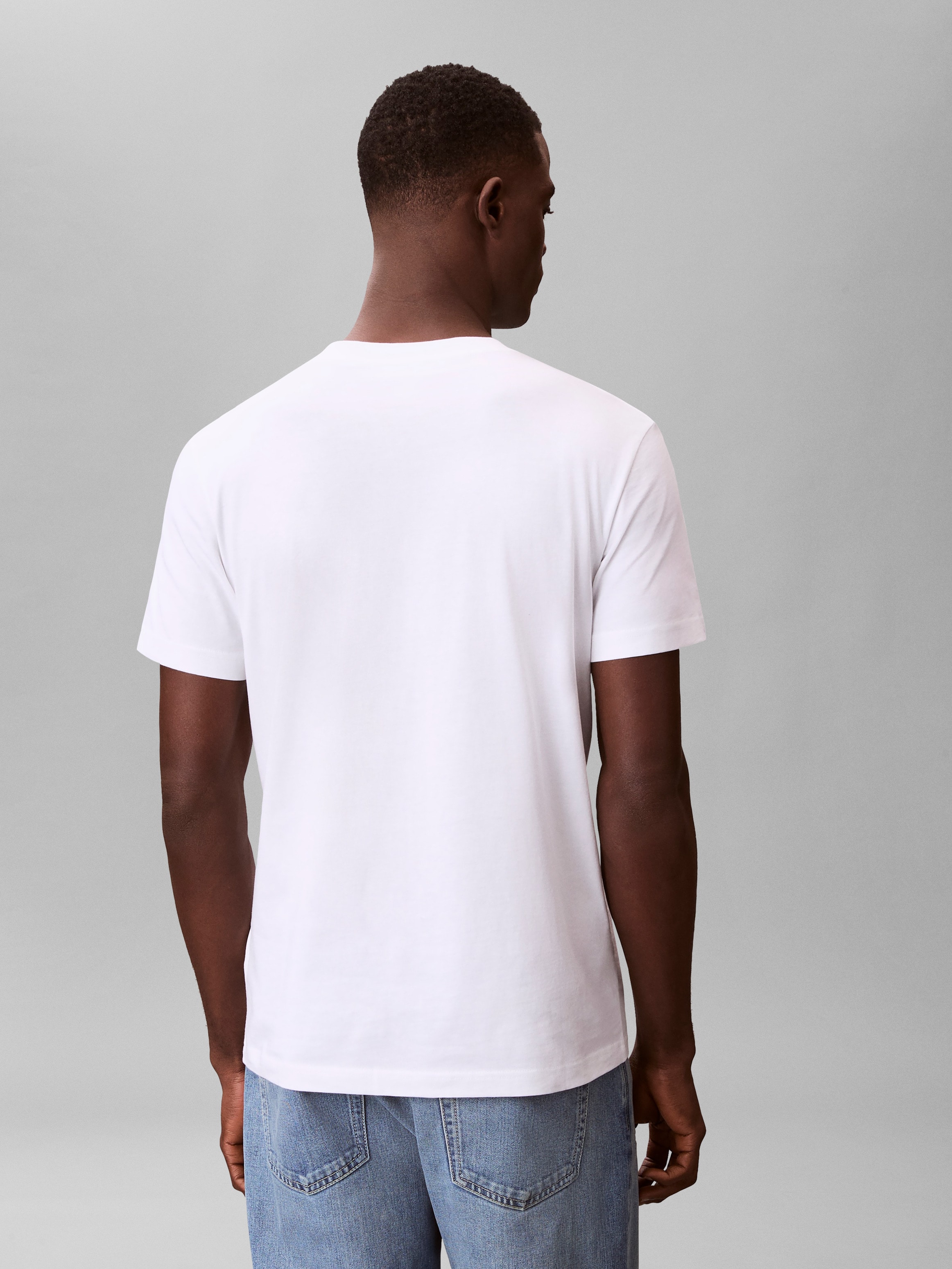 Calvin Klein Jeans T-Shirt Rundhalsausschnitt, Regular Fit, 2-farbiger Logoschriftzug