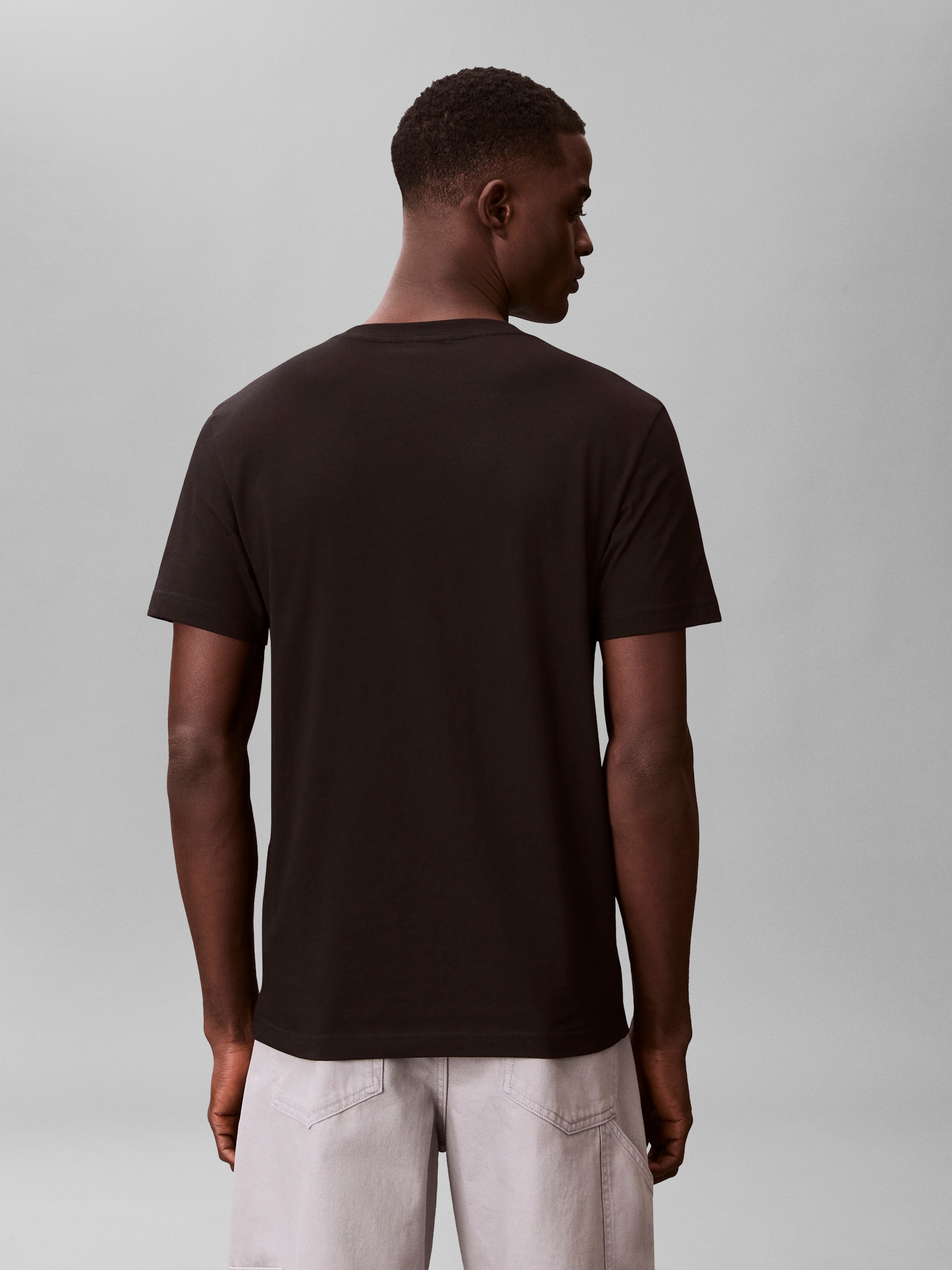 Calvin Klein Jeans T-Shirt Rundhalsausschnitt, Regular Fit, 2-farbiger Logoschriftzug