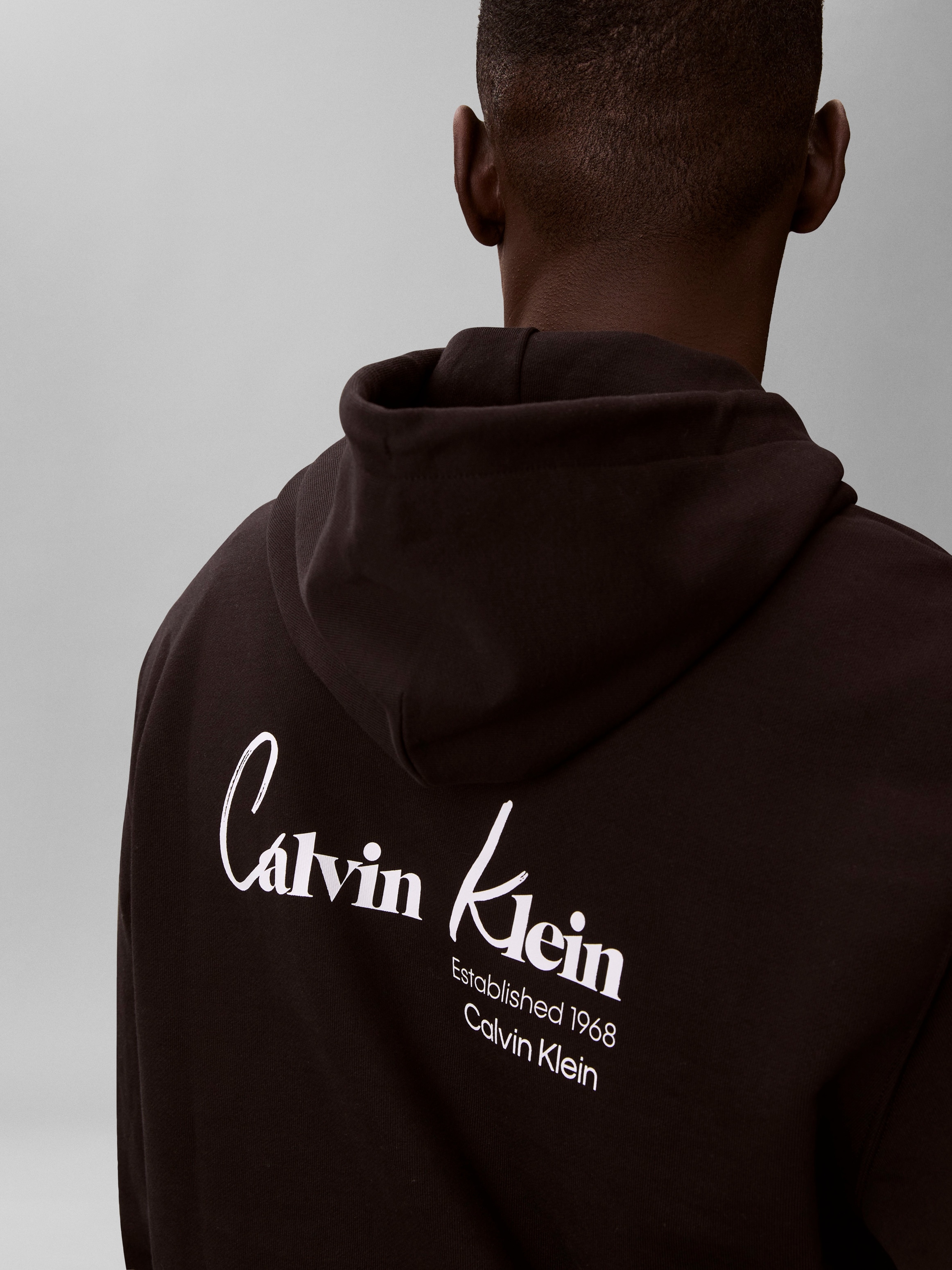 Calvin Klein Jeans Kapuzensweatshirt »GRAPHIC HOODIE«, Regular fit mit Markenprint
