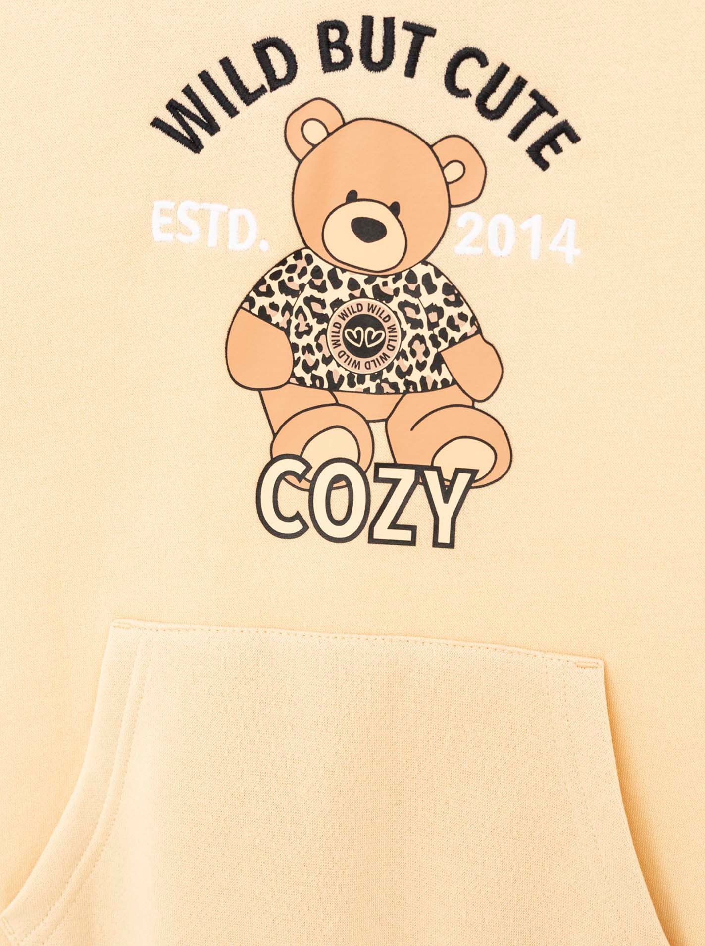 Zwillingsherz Hoodie »"Wild But Cute"« Mini-Me,mit niedlichem Teddybär und selbstbewusstem Slogan