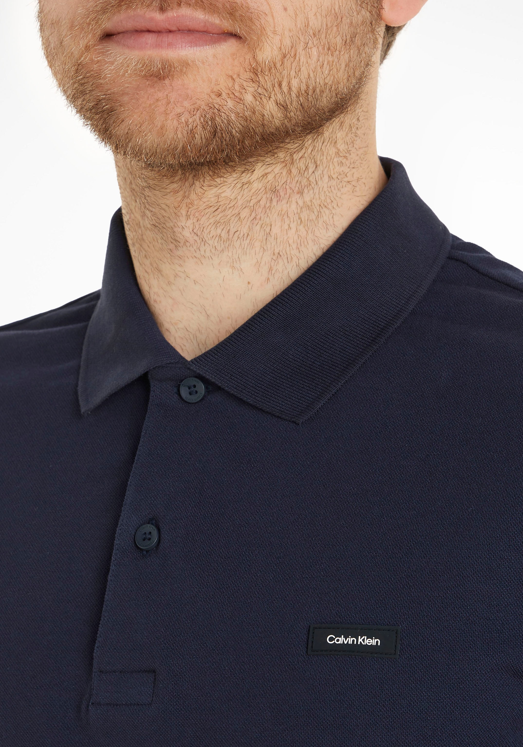 Calvin Klein Brust Poloshirt, online kaufen der bei mit auf OTTO Logo Calvin Klein