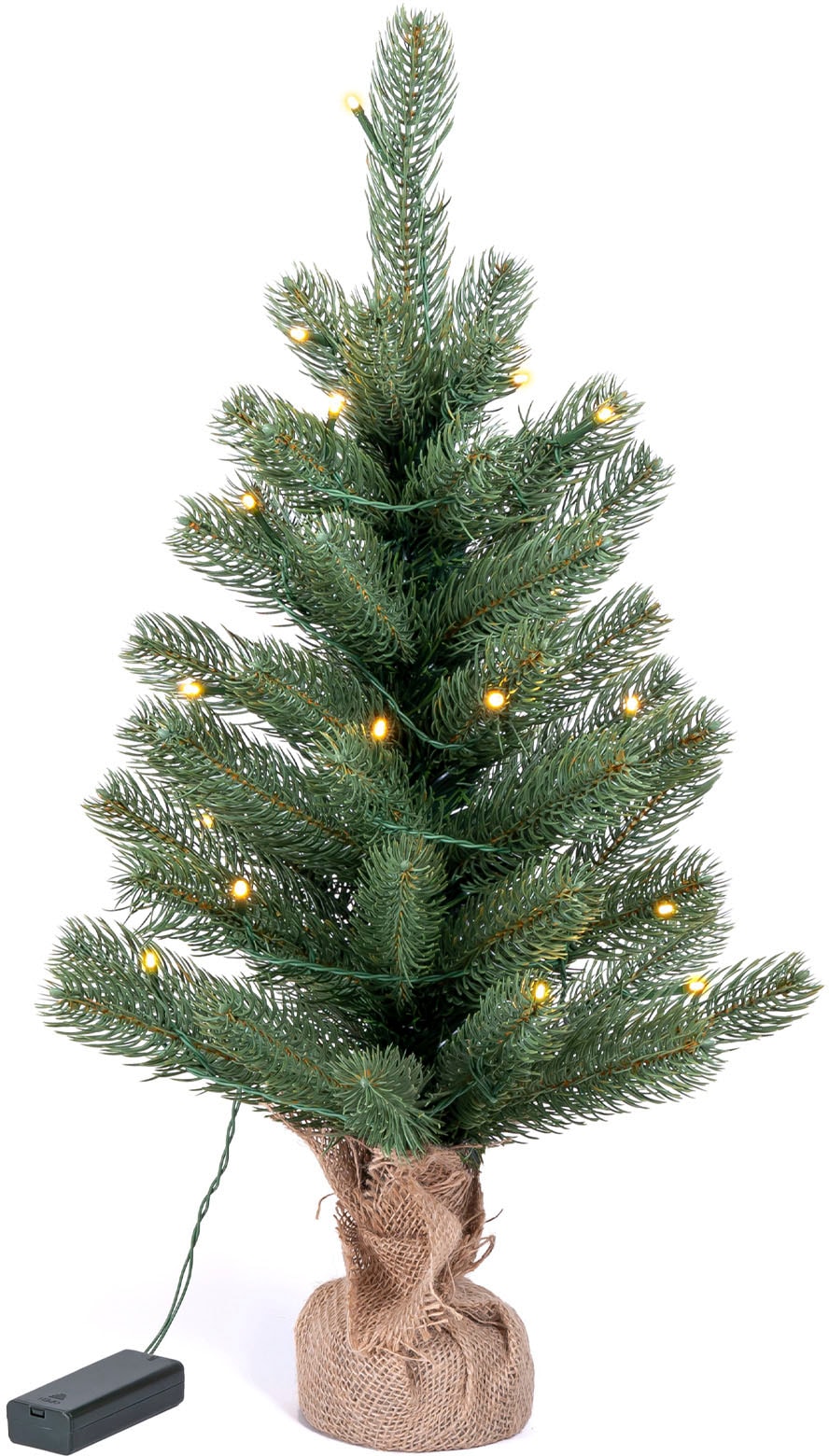 bei Winterworld Künstlicher ca. 60 Weihnachtsdeko Betonfuß, mit Höhe OTTO Nordmanntanne, künstlicher Batteriebetrieb Christbaum, den um IC cm«, Weihnachtsbaum »LED-Tannenbaum, kaufen Jutebeutel