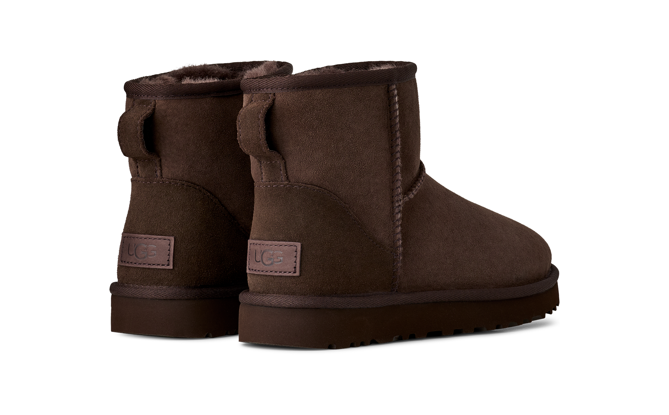 UGG Winterboots »Unisex, W CLASSIC MINI II«  Schlupfschuh, Kurz-Boots mit Ziernähten