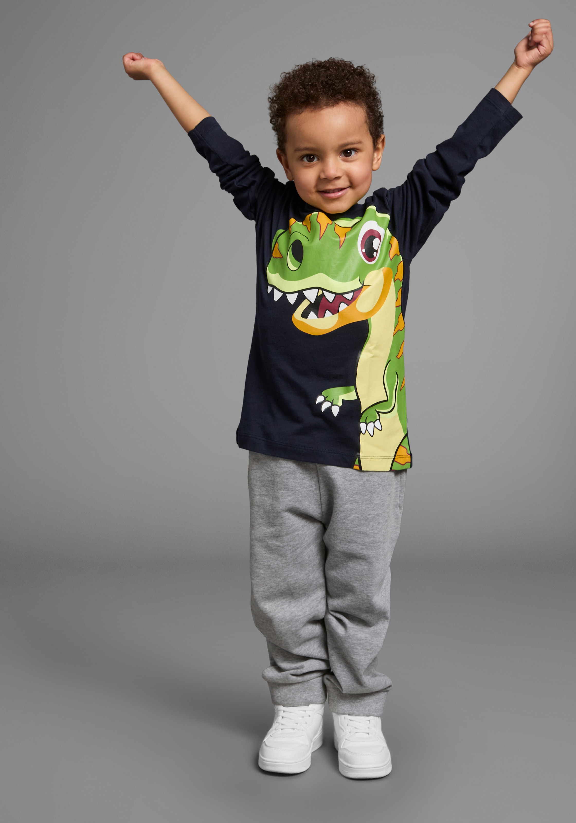 KIDSWORLD Langarmshirt »CURIOUS DINO«, Langarm, Basic-Passform, peppiger Druck