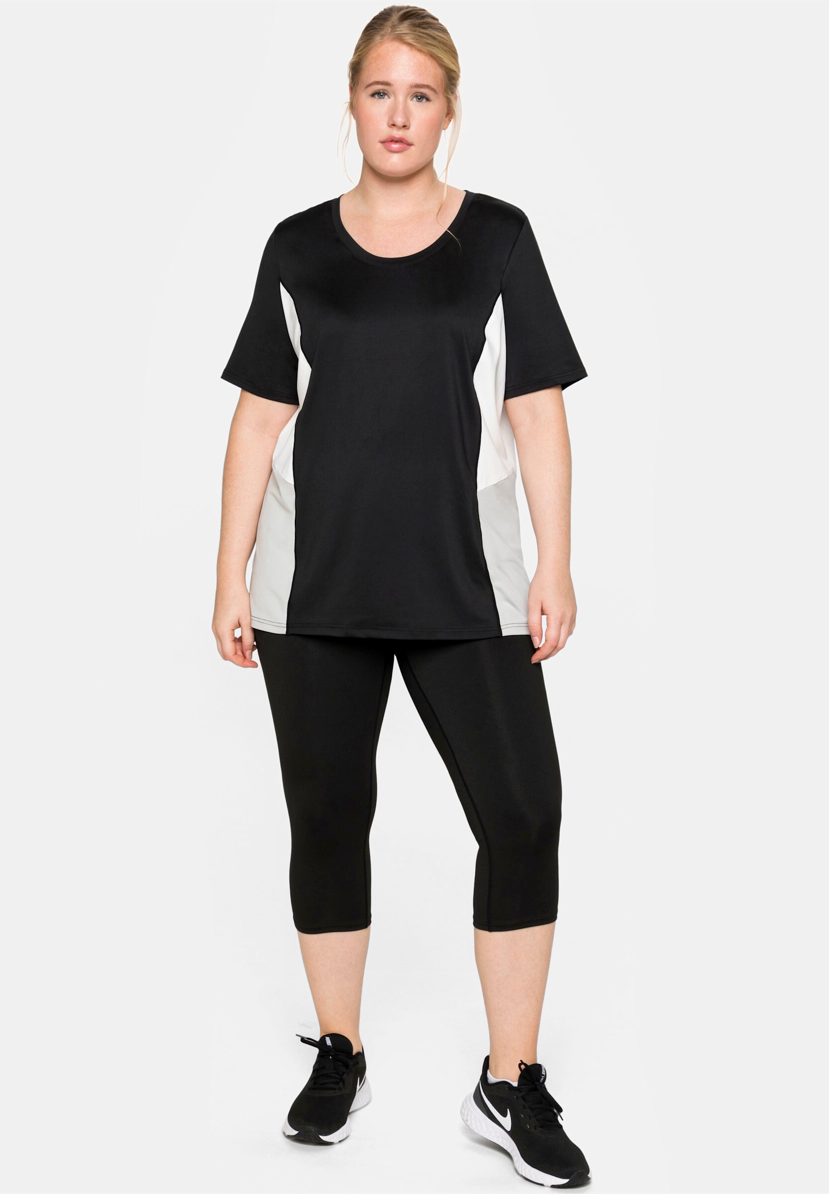 Sheego Schlupfhose »Sporthose Funktionstights in Caprilänge«  aus Funktionsqualität, mit Innentasche