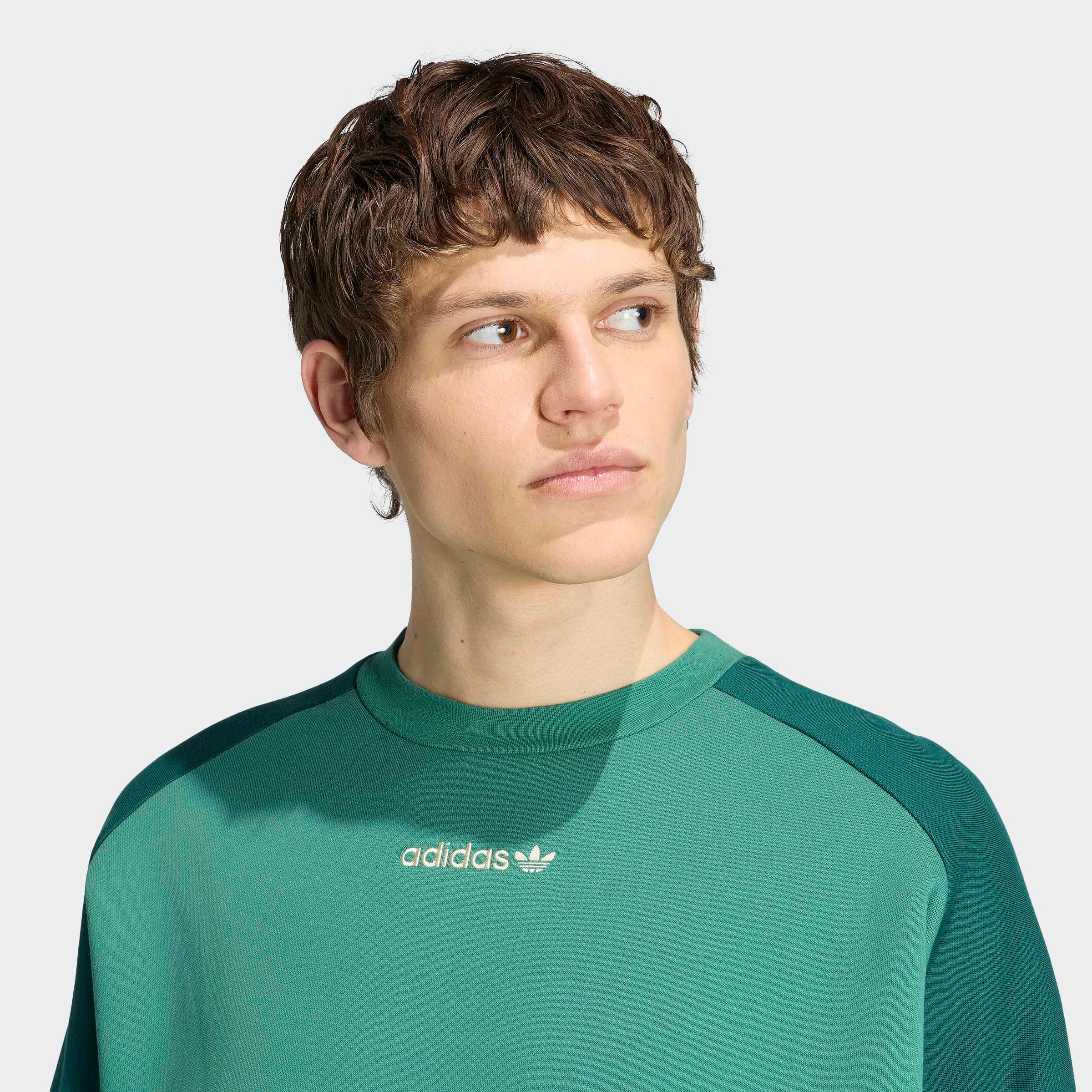 adidas Originals Sweatshirt »MUNICH 93 RUNDHALS«, mit angesetzten Bündchen an Ärmel- und Rumpfabschluss
