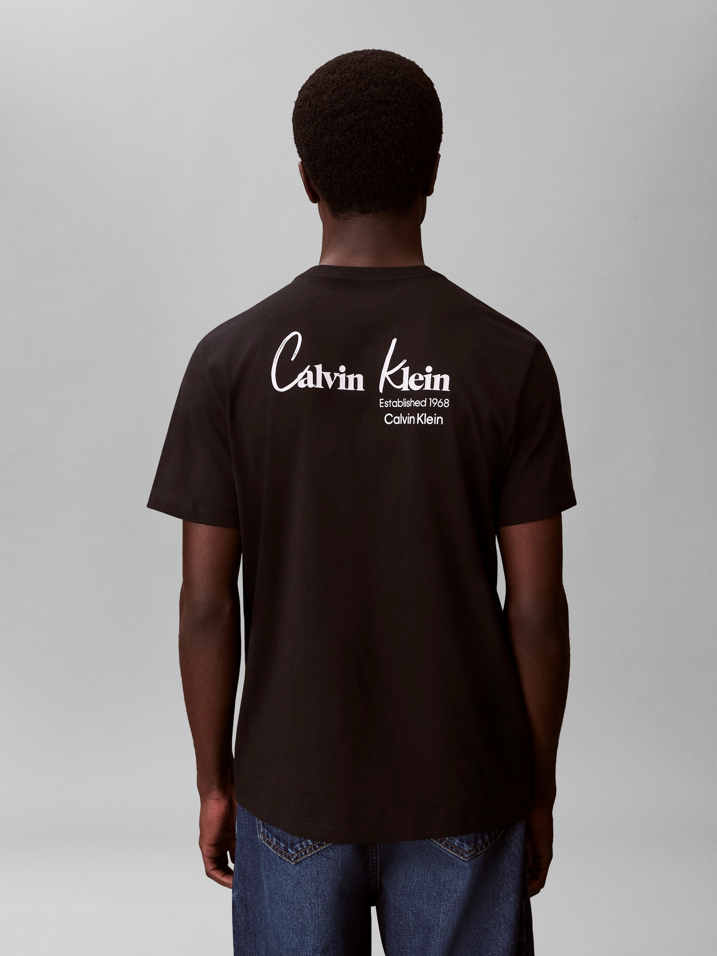 Calvin Klein Jeans T-Shirt »JEANS GRAPHICS« Regular fit mit Markenprint