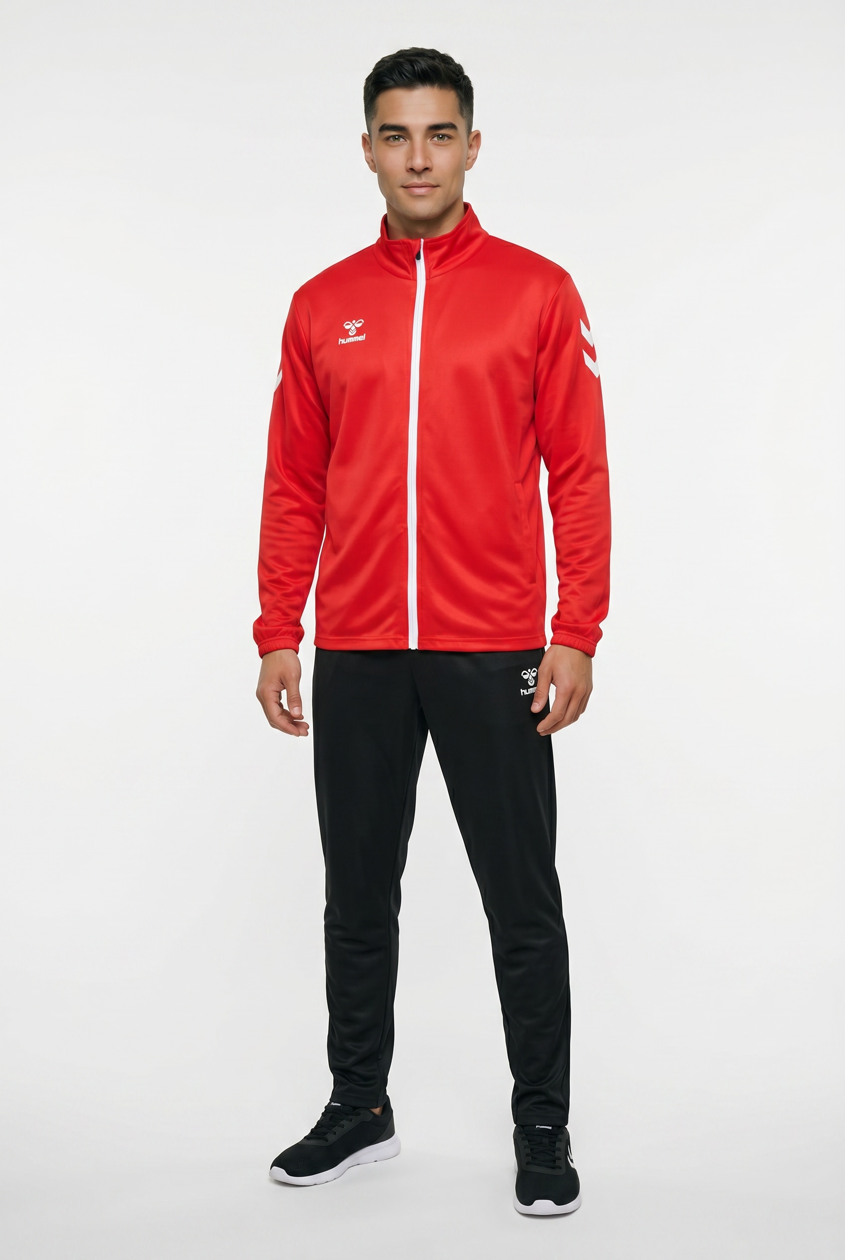 hummel Trainingsanzug »HMLLOGO SUIT« 2 Stk. zweiteiliges Set, ohne Kapuze, aus Polyester